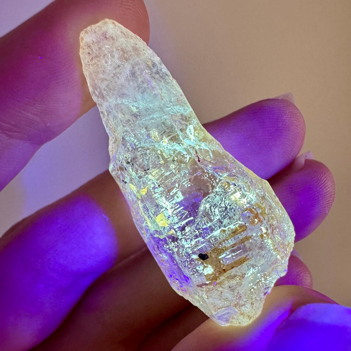 Petroleum Quartz | UV reactive firefly crystal, fluorescent mineral specimen from Madagascar