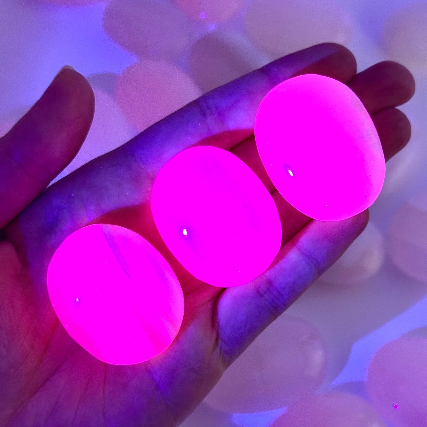 Mangano Calcite Palm Stone | UV-reactive Pink Crystal Worry Stone (Heart Chakra)