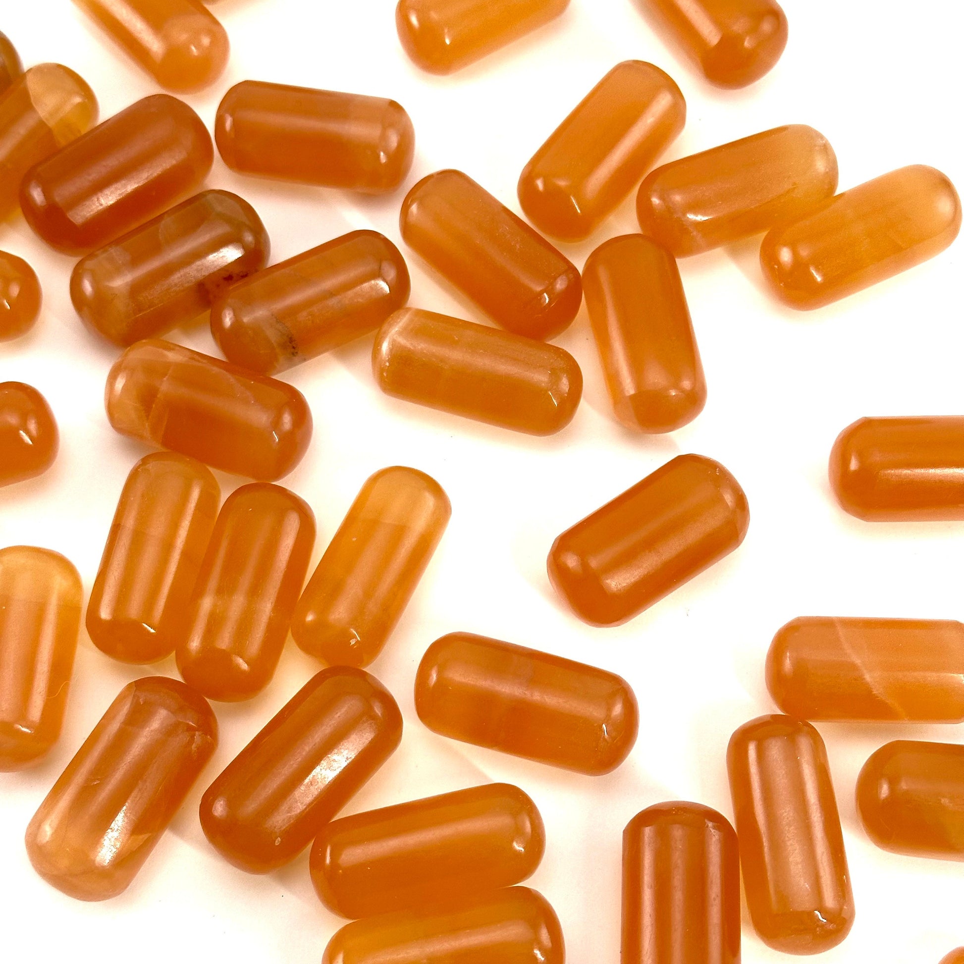 ONE Polished Honey Calcite, natural orange calcite, polished honey calcite, orange calcite tumble, honey calcite crystal, tumbled stones