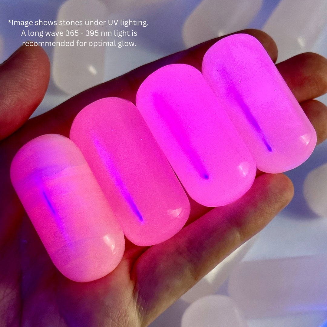 ONE UV-reactive mangano calcite tumble, mangano calcite, polished mangano calcite, mangano calcite tumble, mangano calcite crystal