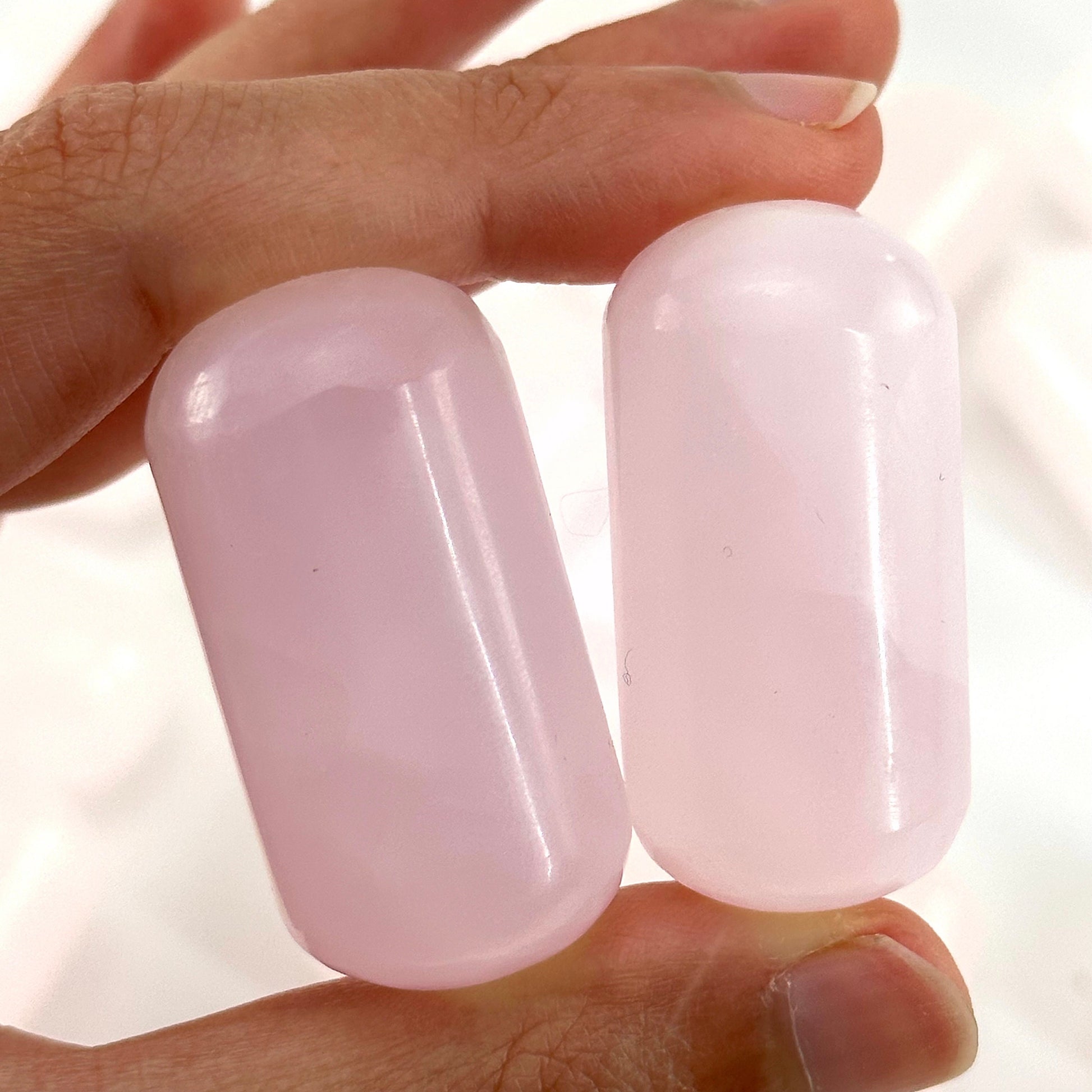 ONE UV-reactive mangano calcite tumble, mangano calcite, polished mangano calcite, mangano calcite tumble, mangano calcite crystal