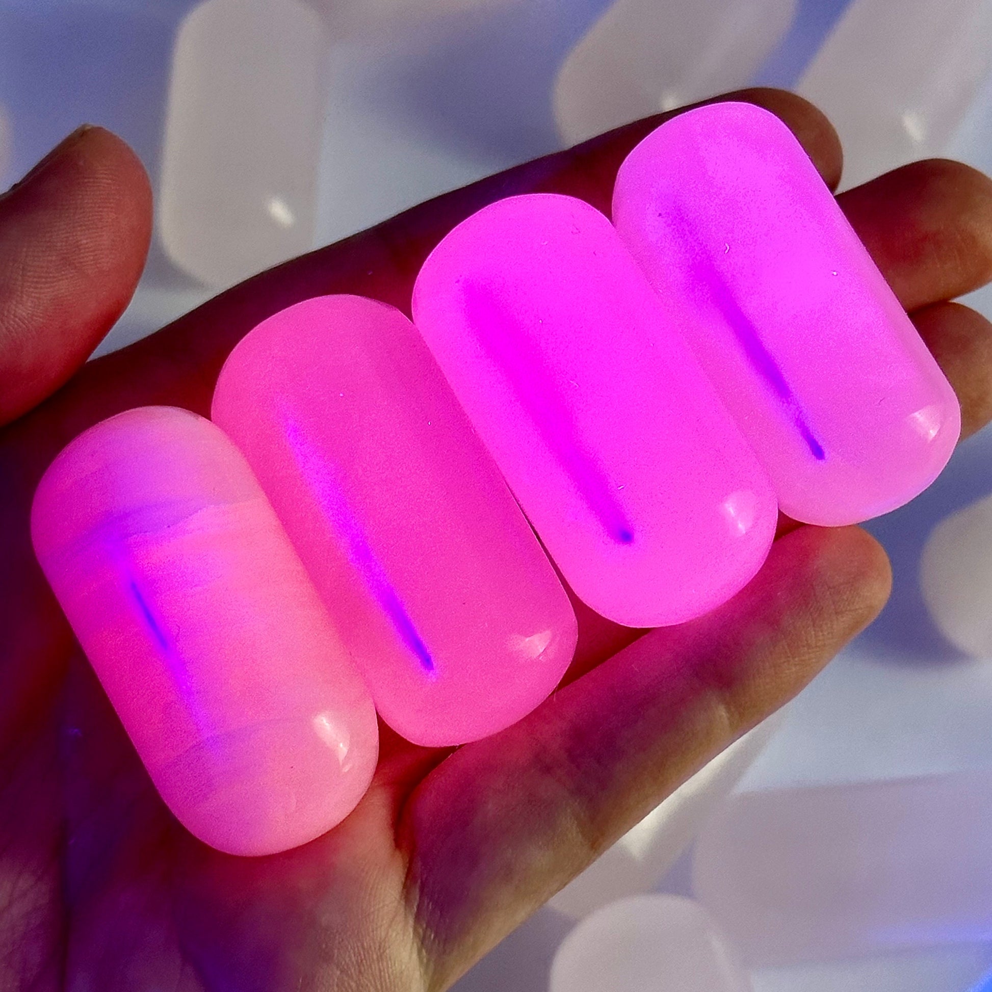 ONE UV-reactive mangano calcite tumble, mangano calcite, polished mangano calcite, mangano calcite tumble, mangano calcite crystal