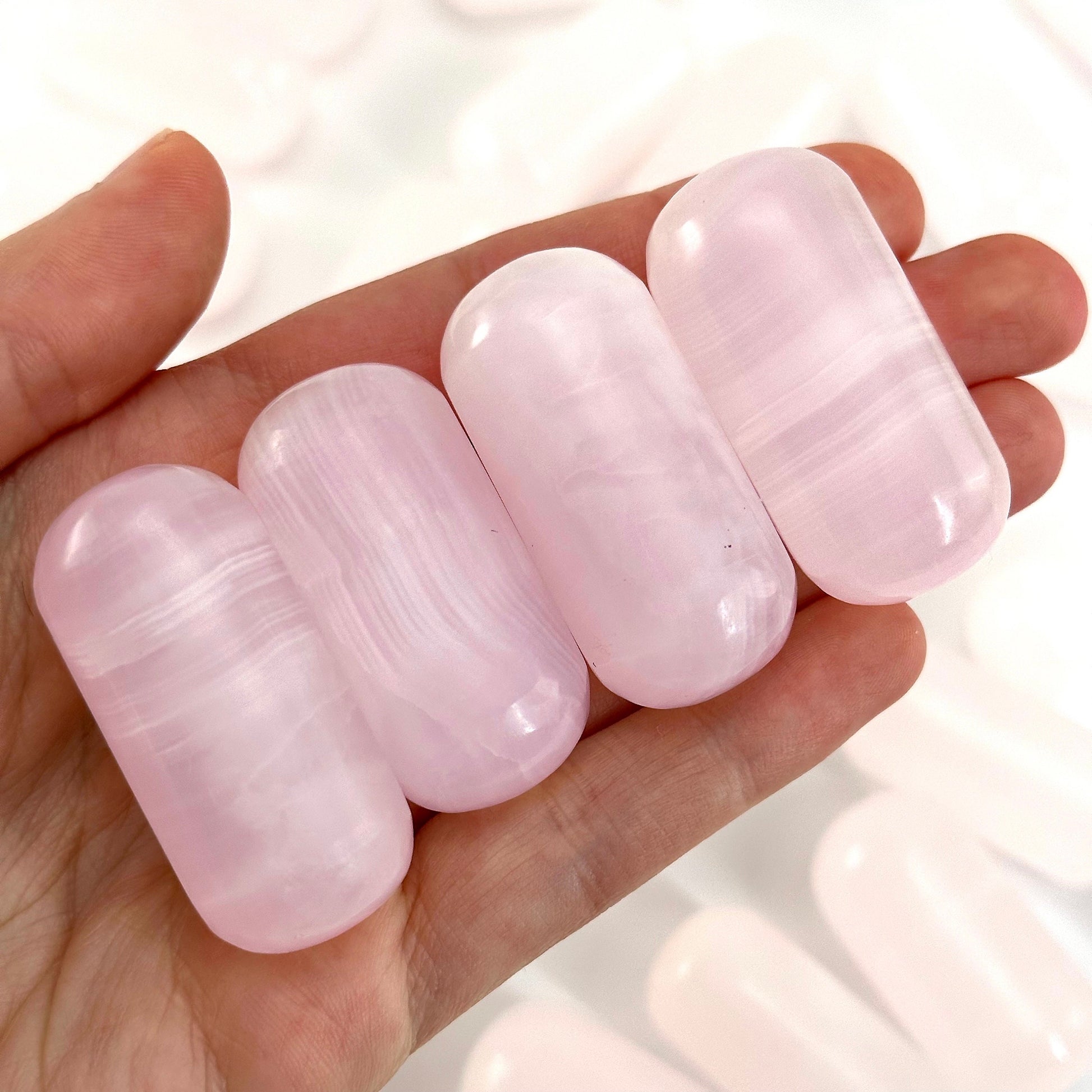 ONE UV-reactive mangano calcite tumble, mangano calcite, polished mangano calcite, mangano calcite tumble, mangano calcite crystal