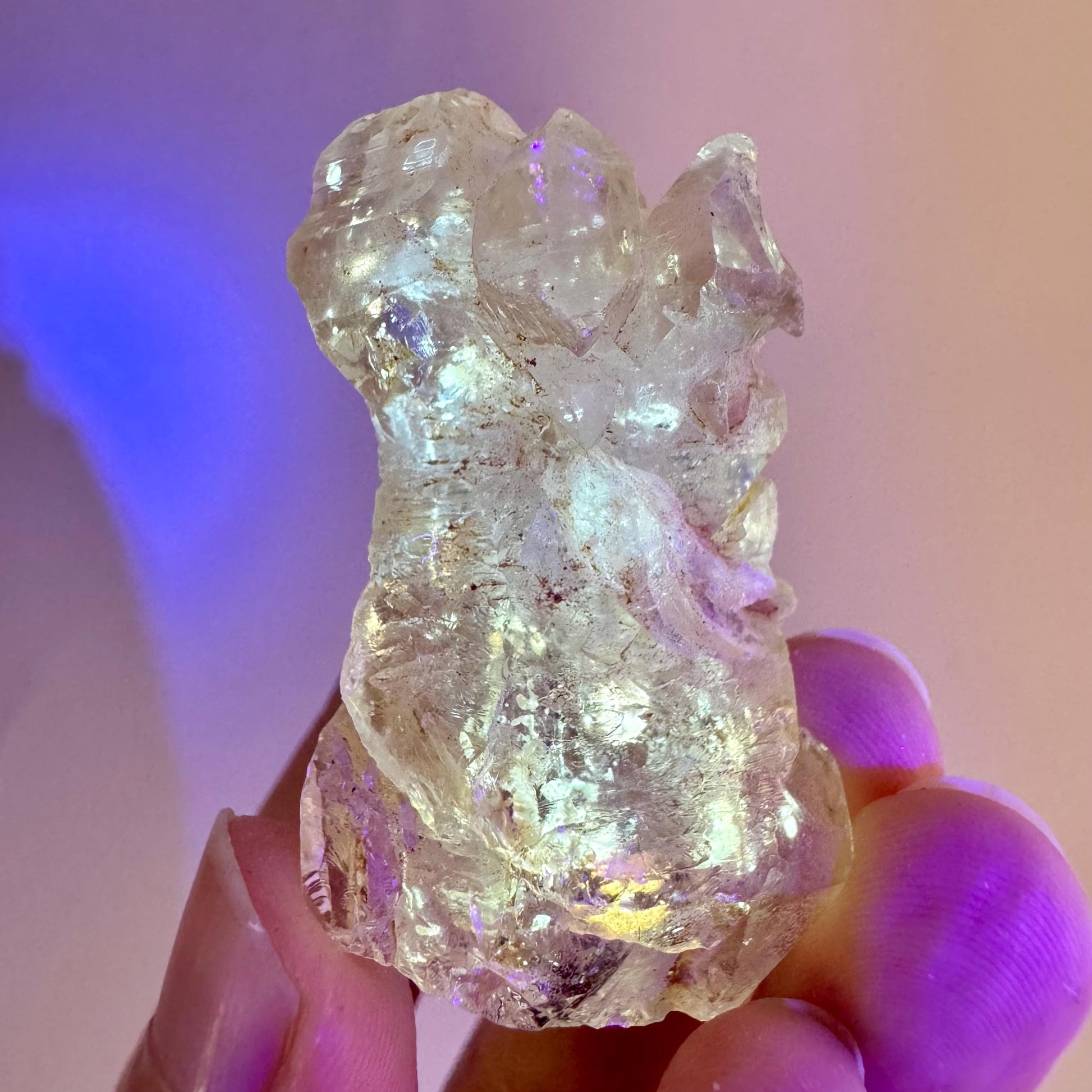 Firefly Petroleum Quartz | UV reactive crystal, fluorescent mineral from Madagascar