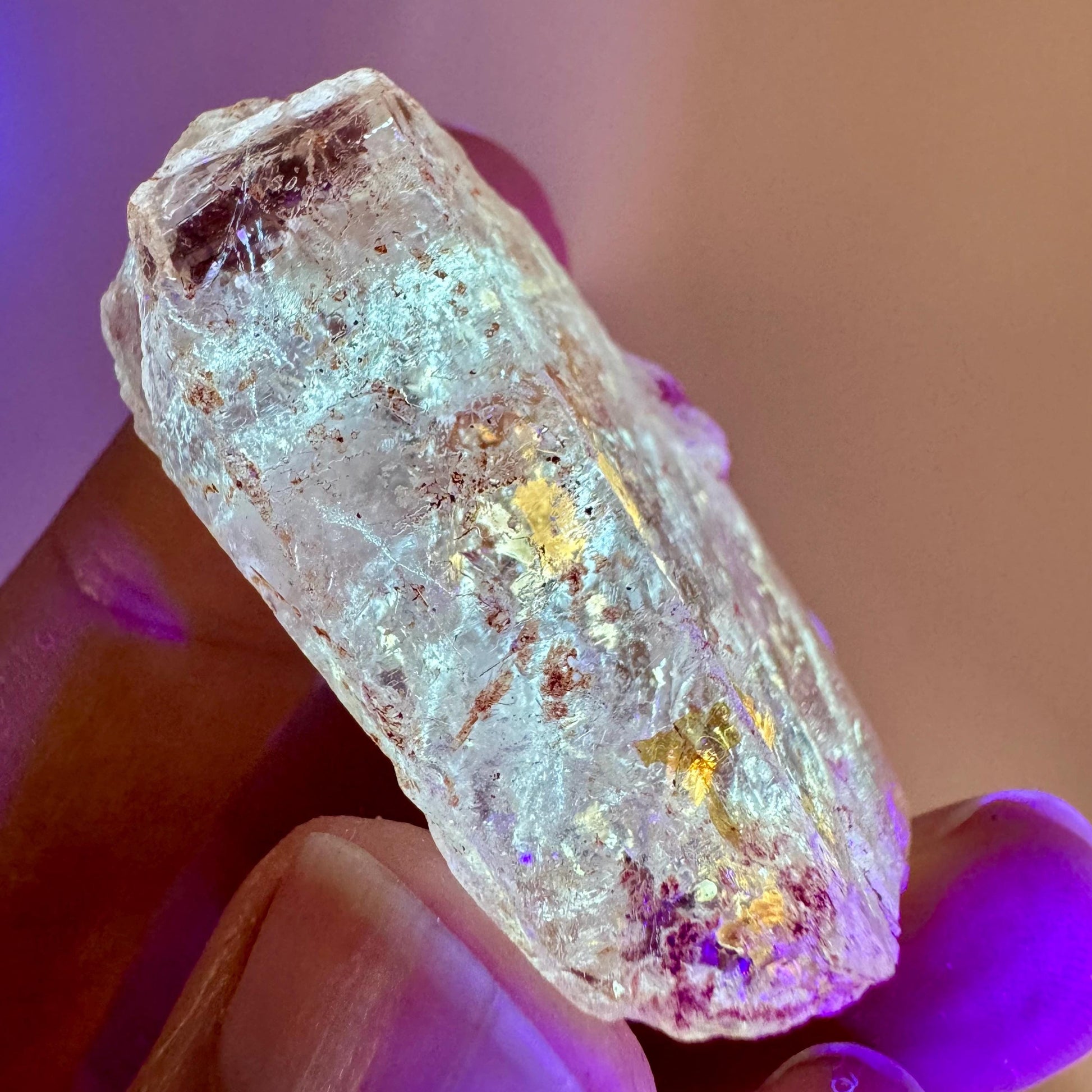 Firefly Petroleum Quartz | UV reactive crystal, fluorescent mineral from Madagascar