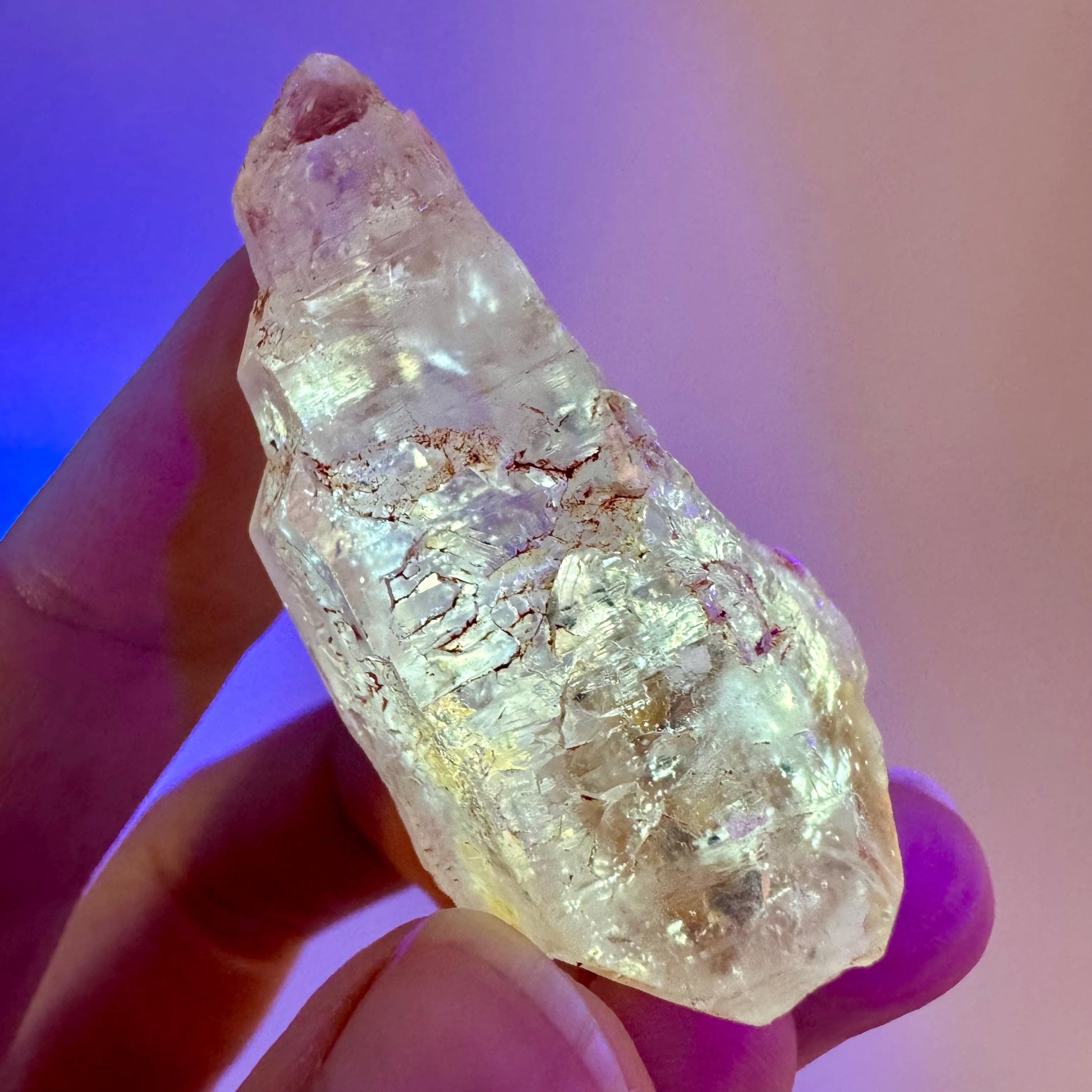 Firefly Petroleum Quartz | UV reactive crystal, fluorescent mineral from Madagascar
