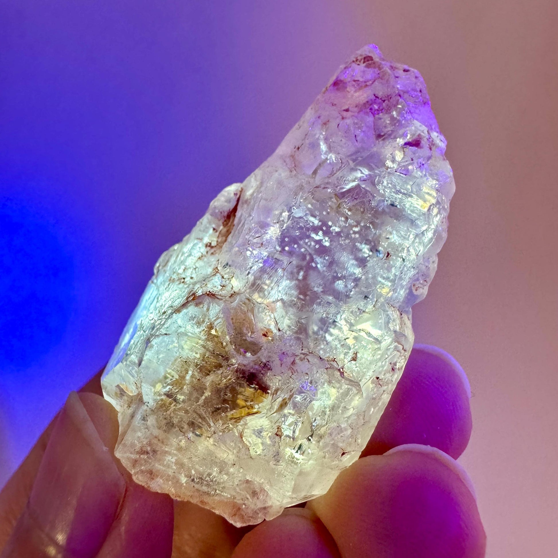 Firefly Petroleum Quartz | UV reactive crystal, fluorescent mineral from Madagascar