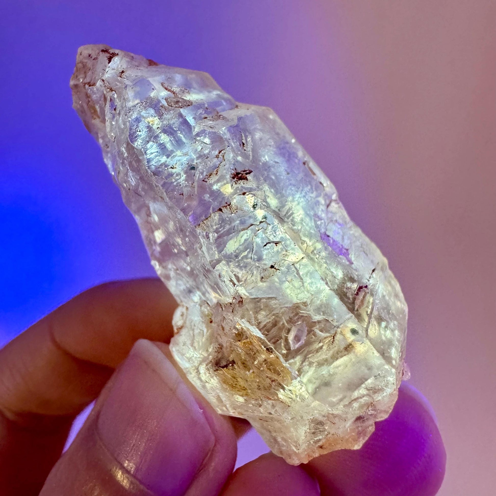 Firefly Petroleum Quartz | UV reactive crystal, fluorescent mineral from Madagascar