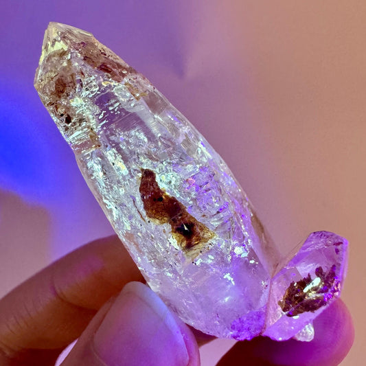 Firefly Petroleum Quartz | UV reactive crystal, fluorescent mineral from Madagascar