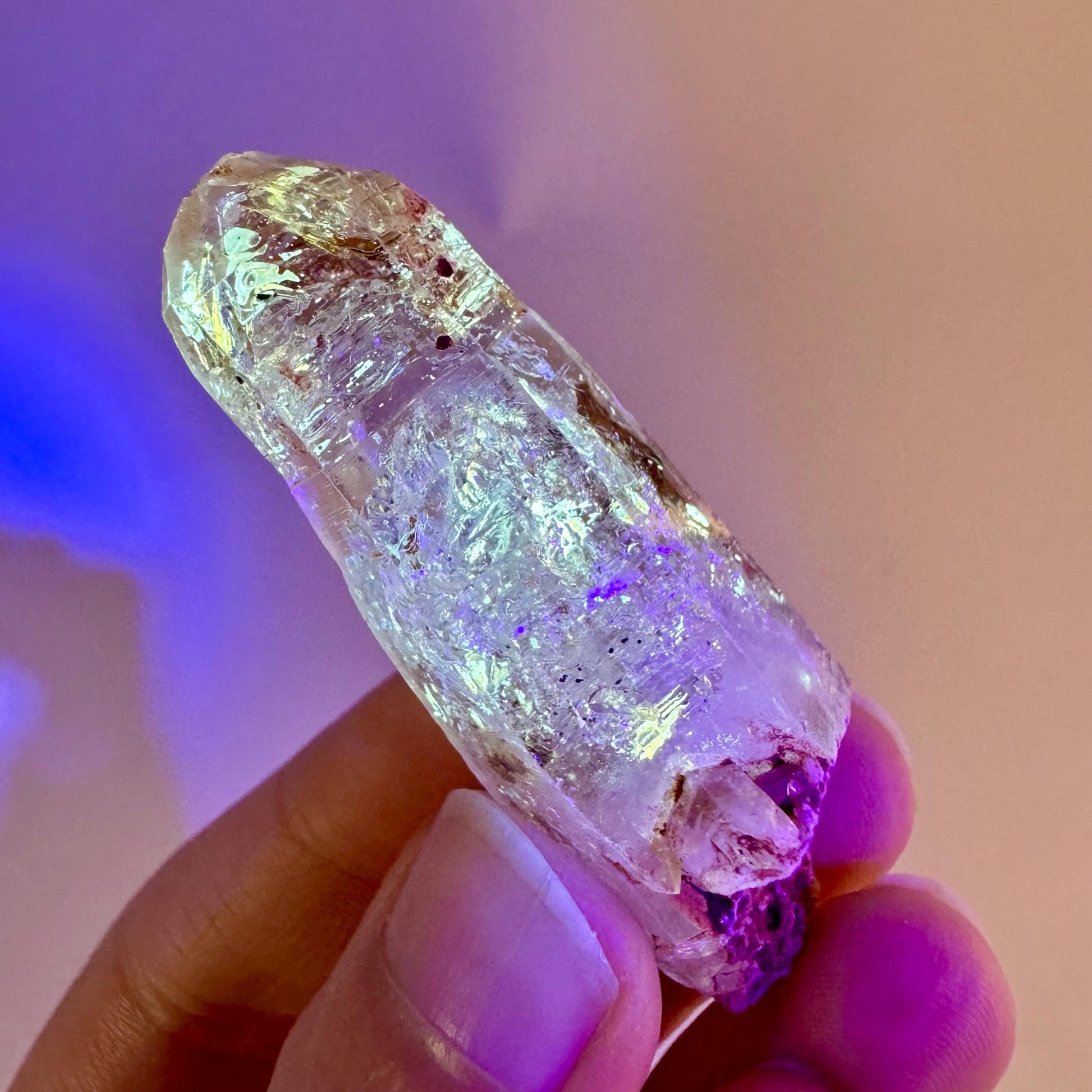 Firefly Petroleum Quartz | UV reactive crystal, fluorescent mineral from Madagascar
