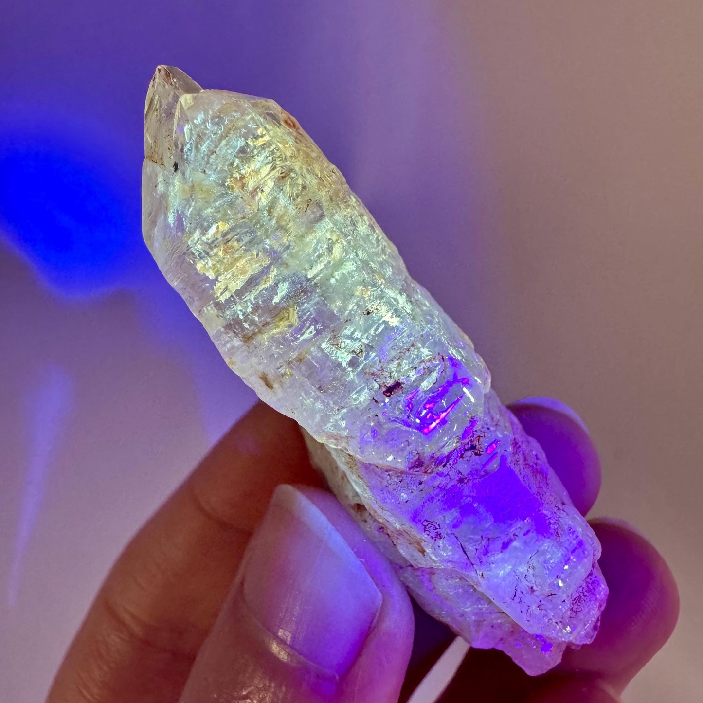 Firefly Petroleum Quartz | UV reactive crystal, fluorescent mineral from Madagascar