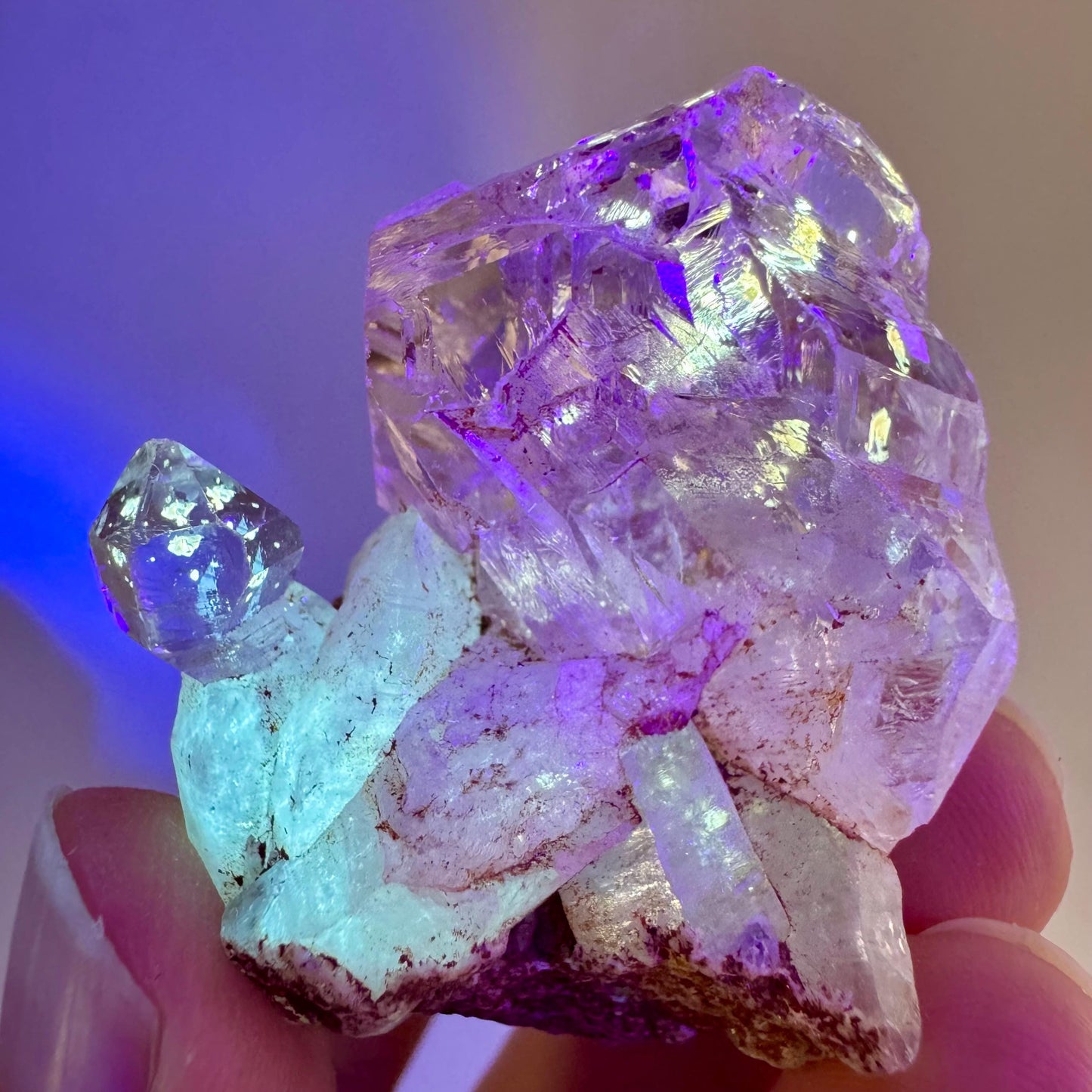 Firefly Petroleum Quartz | UV reactive crystal, fluorescent mineral from Madagascar