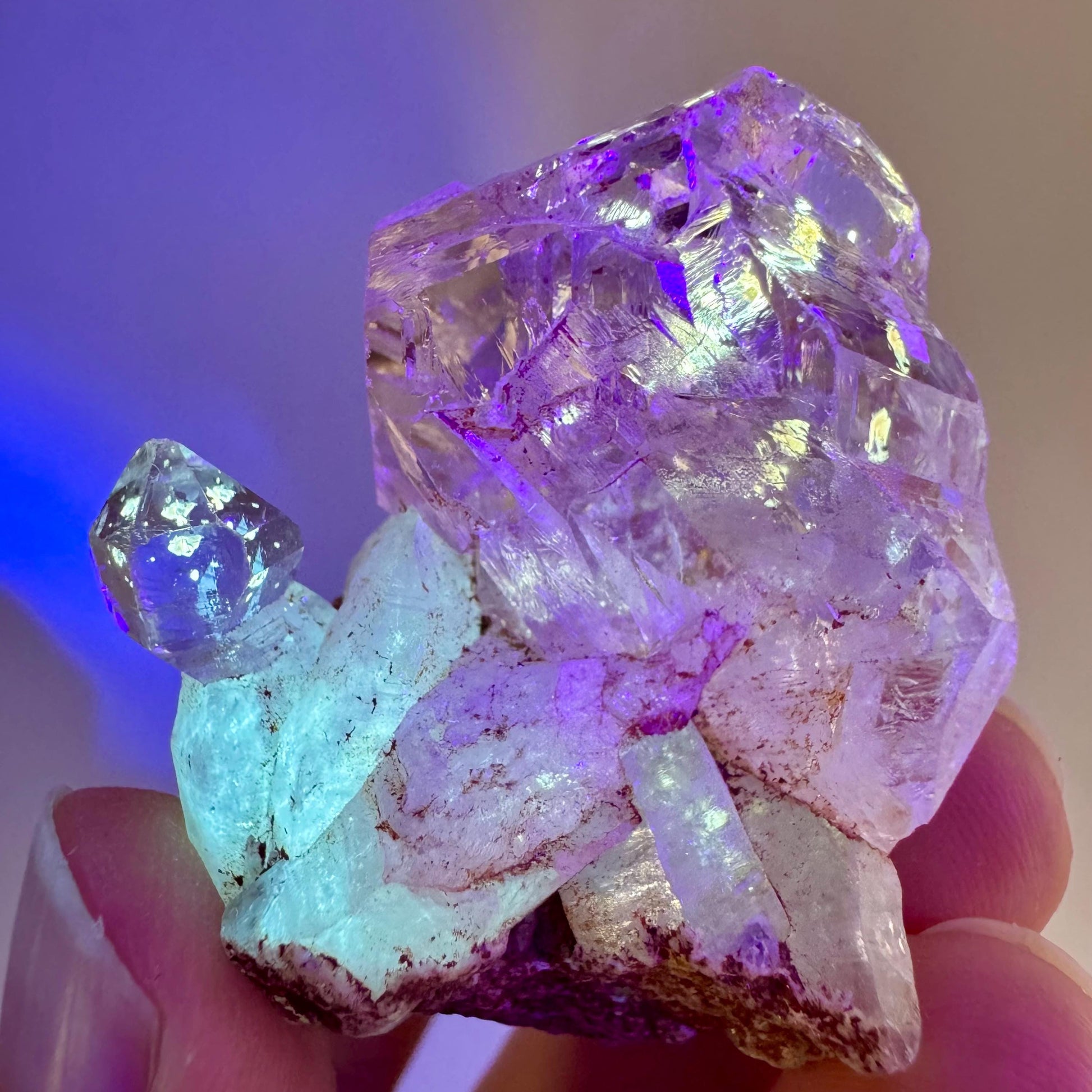 Firefly Petroleum Quartz | UV reactive crystal, fluorescent mineral from Madagascar