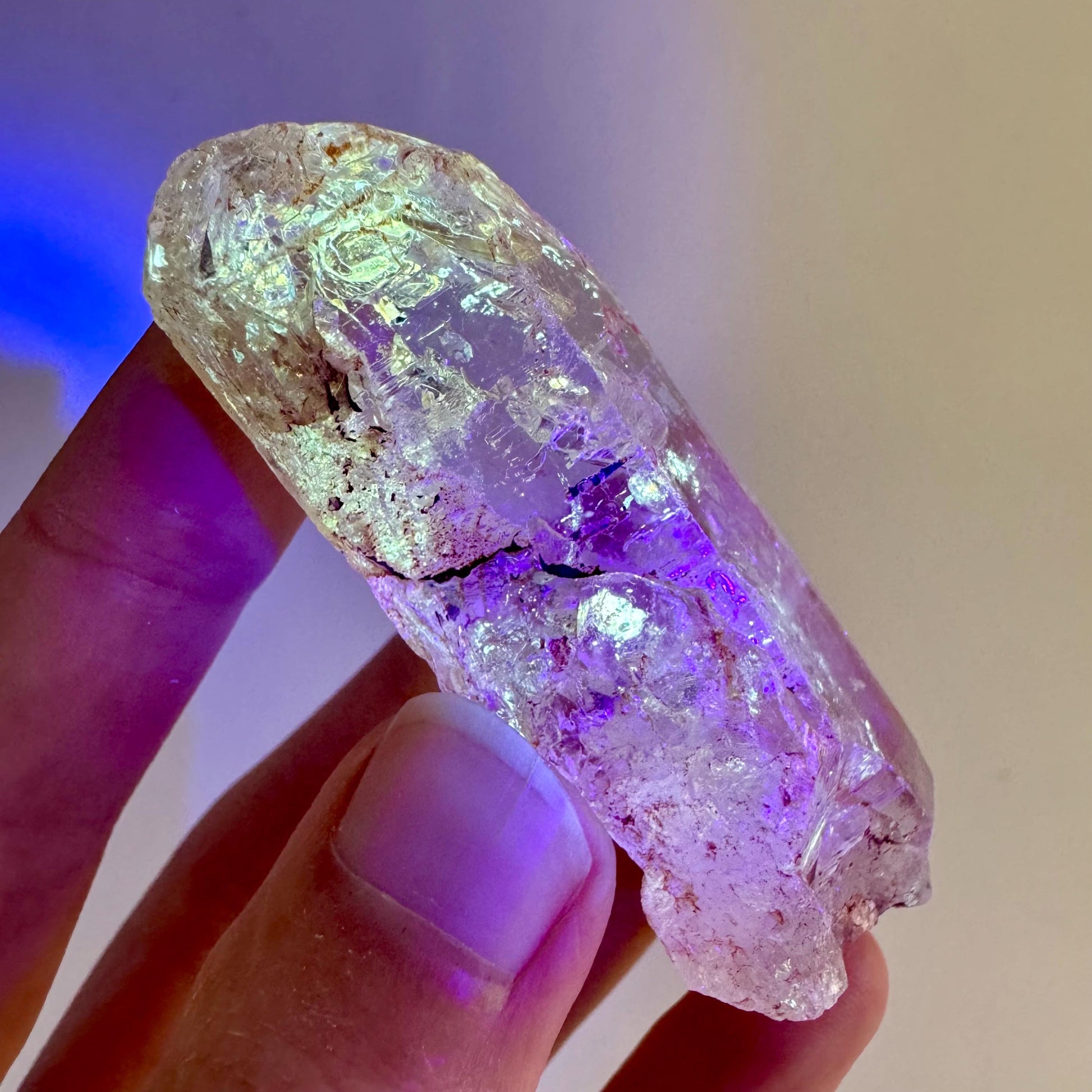 Firefly Petroleum Quartz | UV reactive crystal, fluorescent mineral from Madagascar