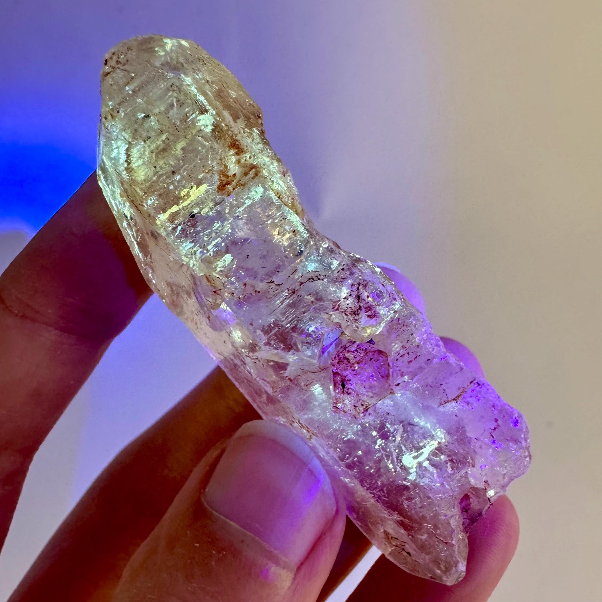 Firefly Petroleum Quartz | UV reactive crystal, fluorescent mineral from Madagascar