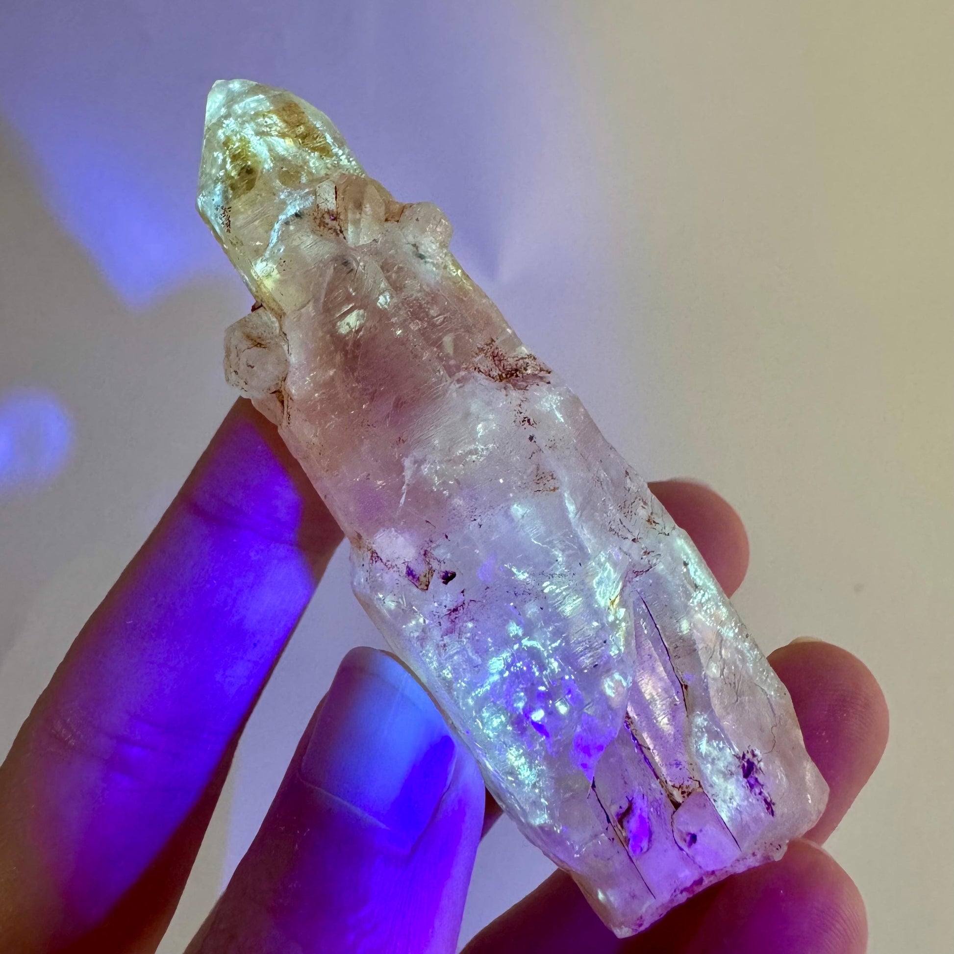 Firefly Petroleum Quartz | UV reactive crystal, fluorescent mineral from Madagascar