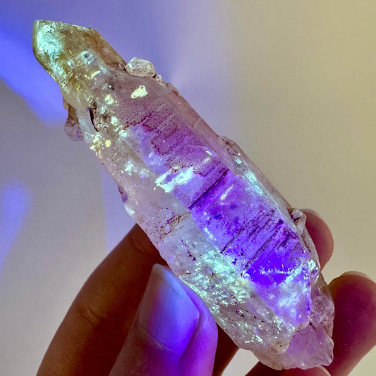 Firefly Petroleum Quartz | UV reactive crystal, fluorescent mineral from Madagascar