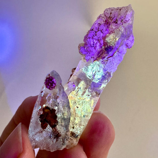 Firefly Petroleum Quartz | UV reactive crystal, fluorescent mineral from Madagascar