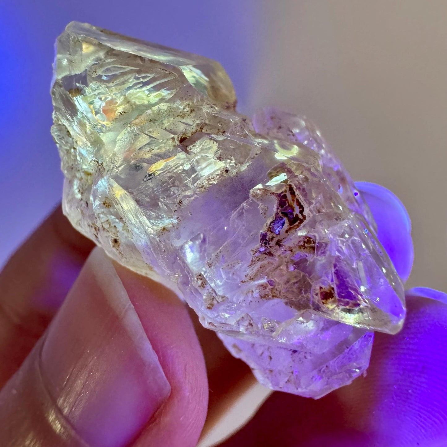 Firefly Petroleum Quartz | UV reactive crystal, fluorescent mineral from Madagascar