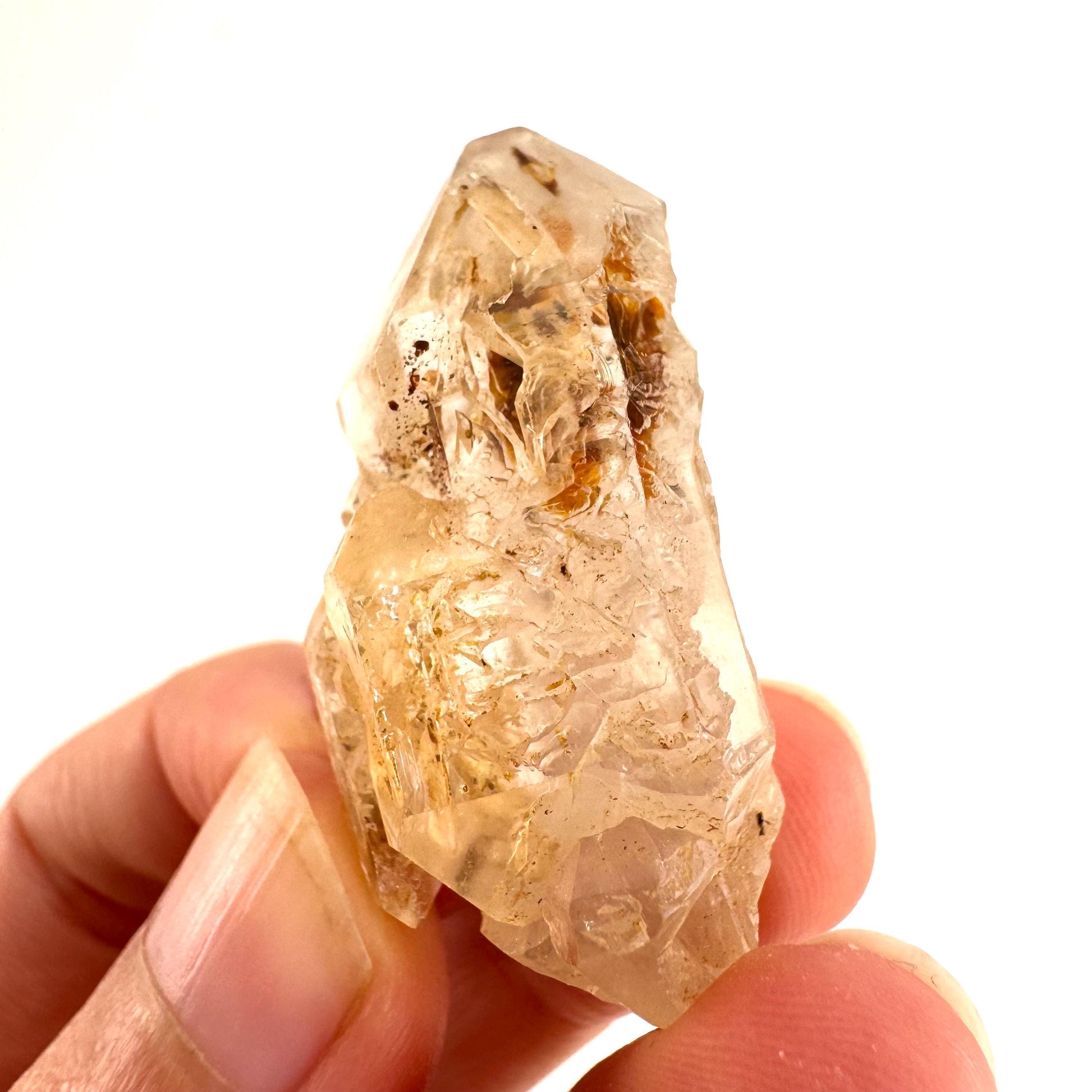 Firefly Petroleum Quartz | UV reactive crystal, fluorescent mineral from Madagascar