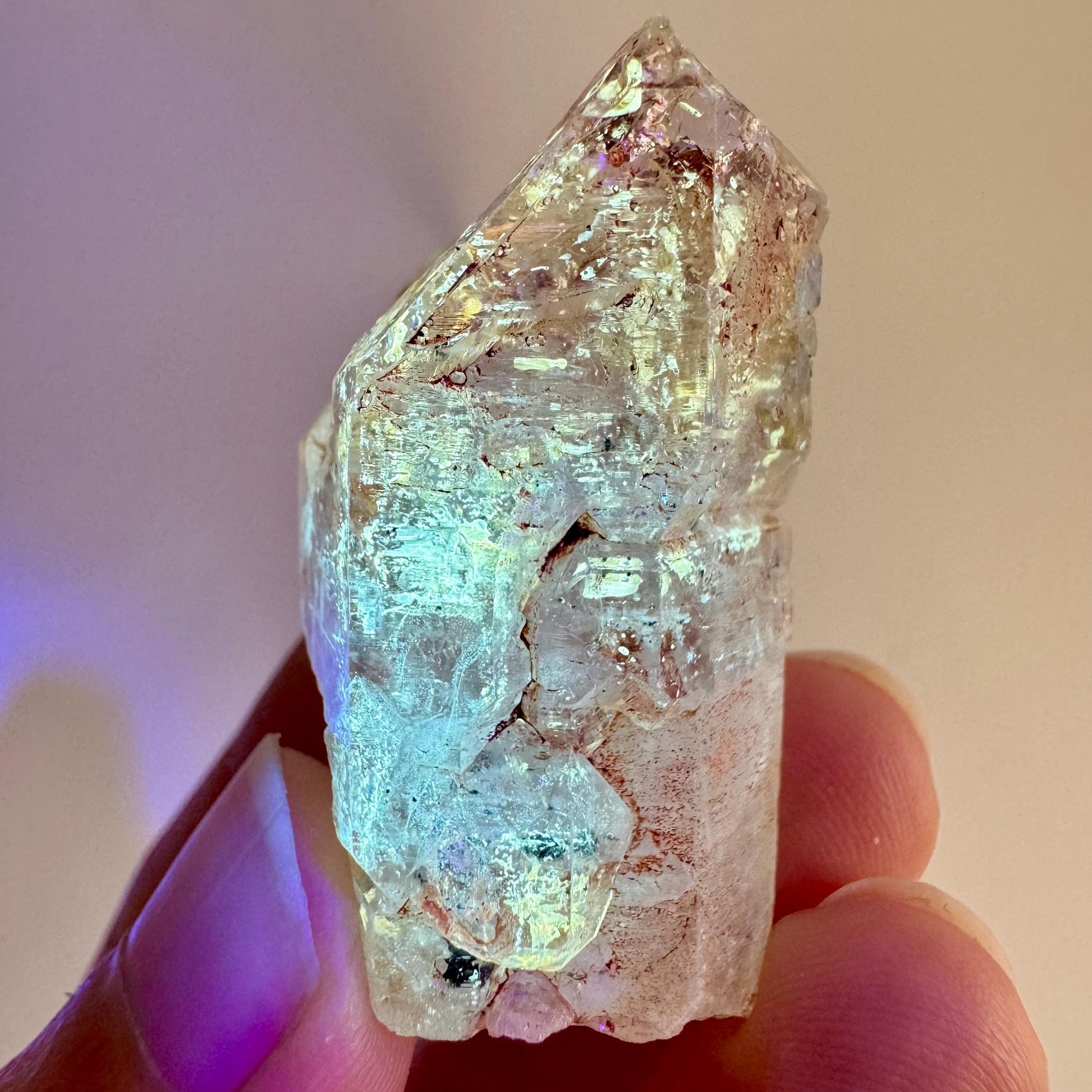 Firefly Petroleum Quartz | UV reactive crystal, fluorescent mineral from Madagascar