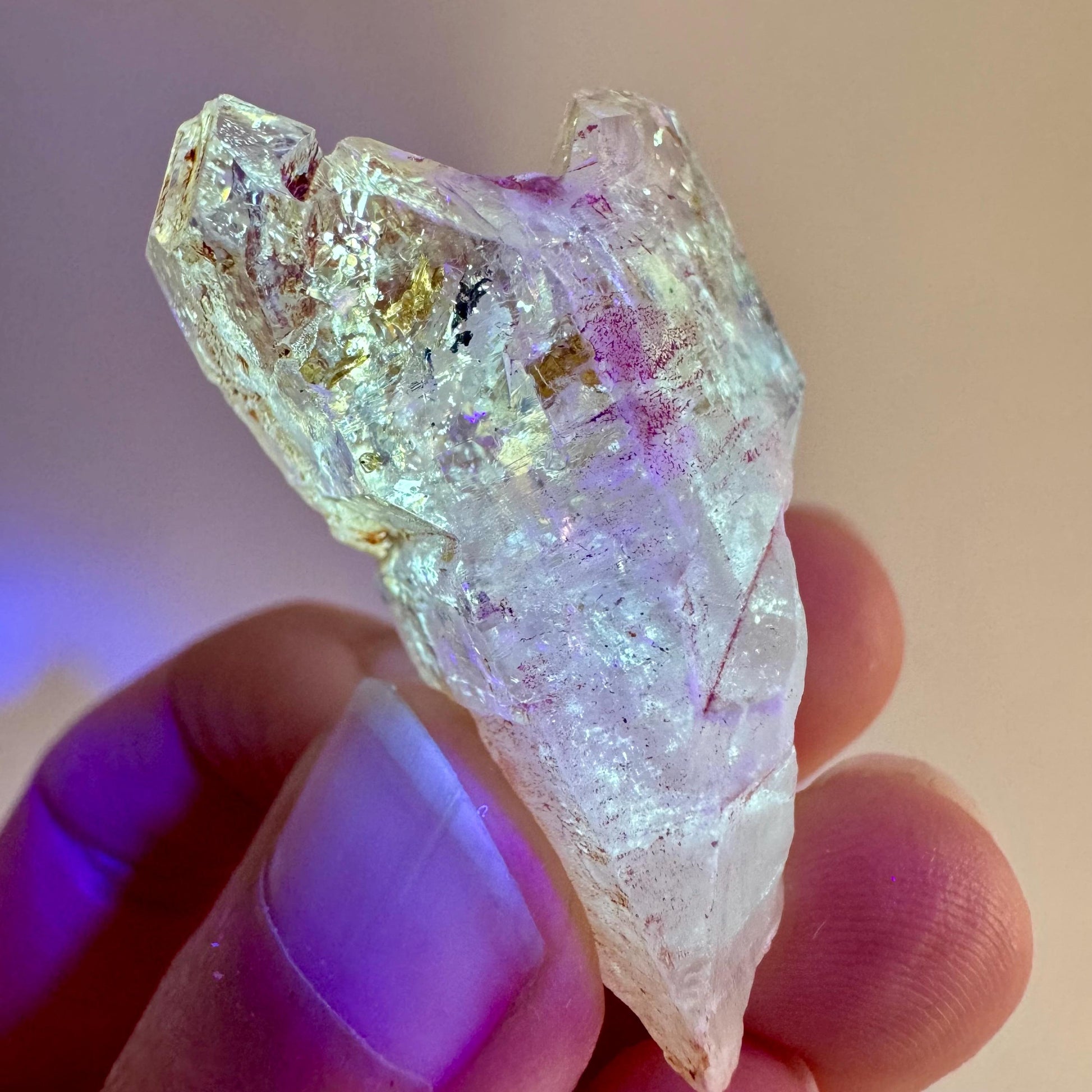 Firefly Petroleum Quartz | UV reactive crystal, fluorescent mineral from Madagascar