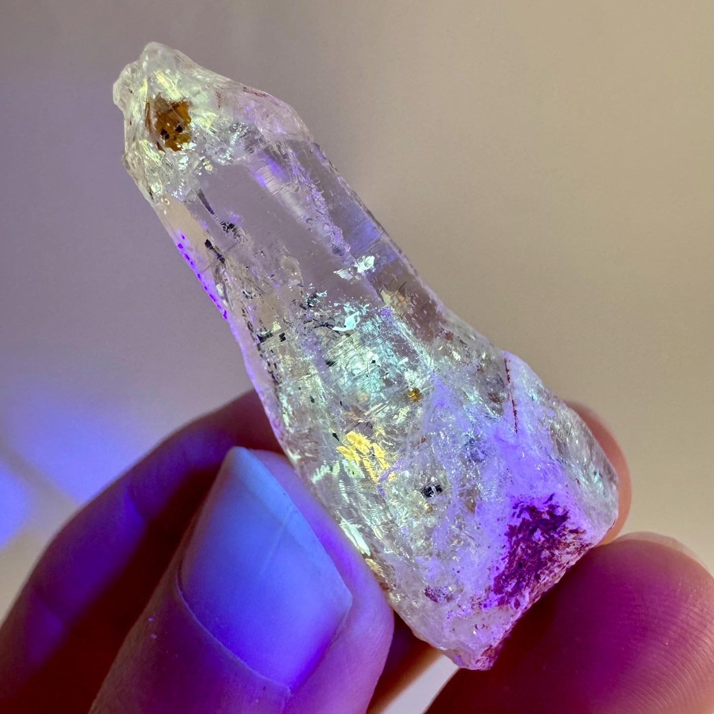 Firefly Petroleum Quartz | UV reactive crystal, fluorescent mineral from Madagascar