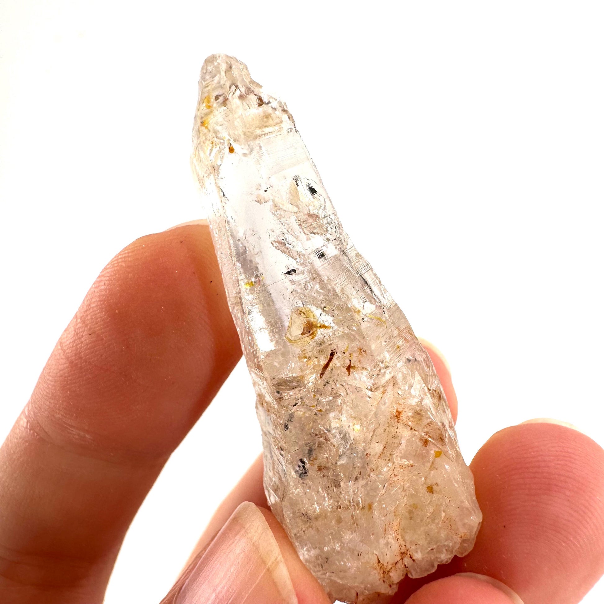 Firefly Petroleum Quartz | UV reactive crystal, fluorescent mineral from Madagascar
