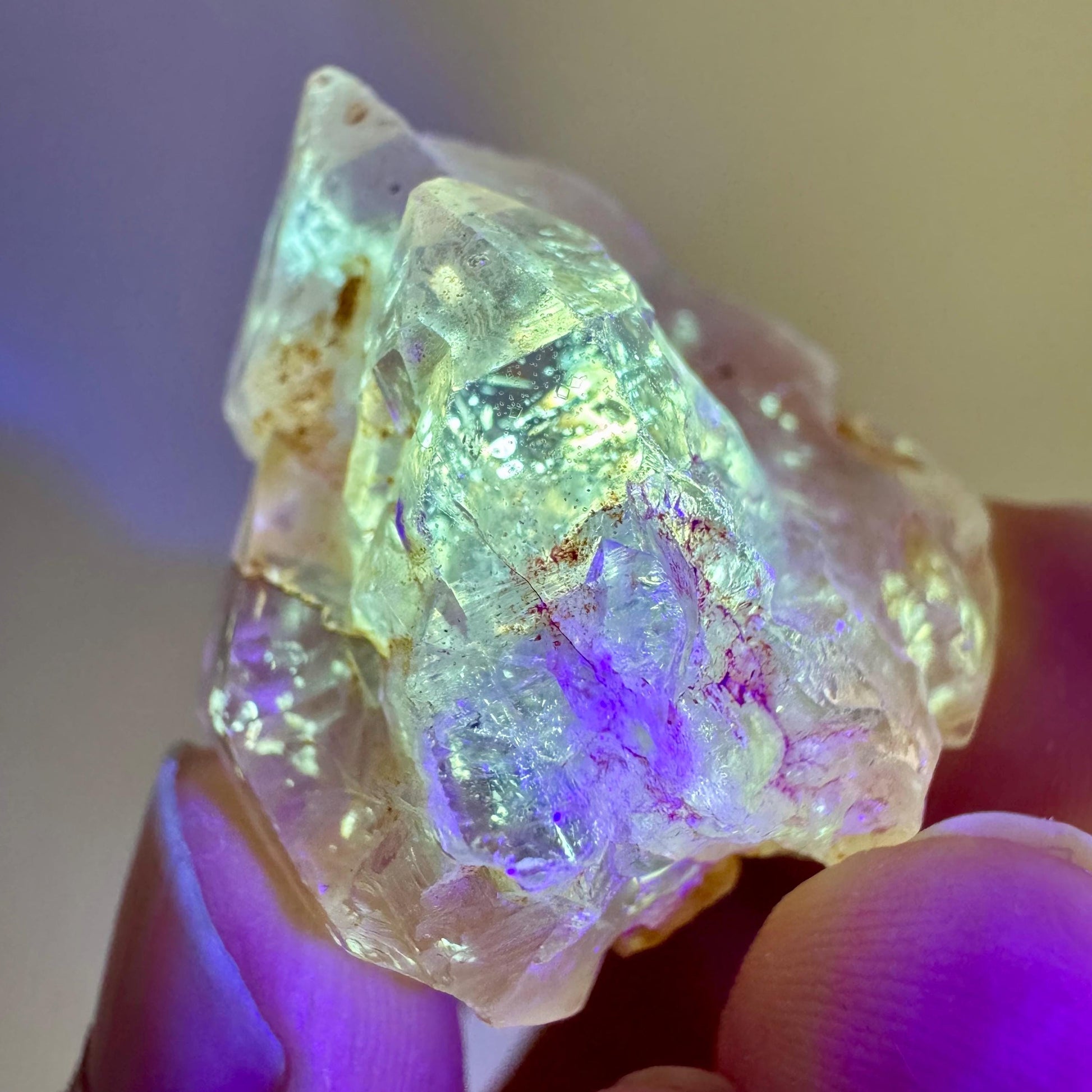 Firefly Petroleum Quartz | UV reactive crystal, fluorescent mineral from Madagascar