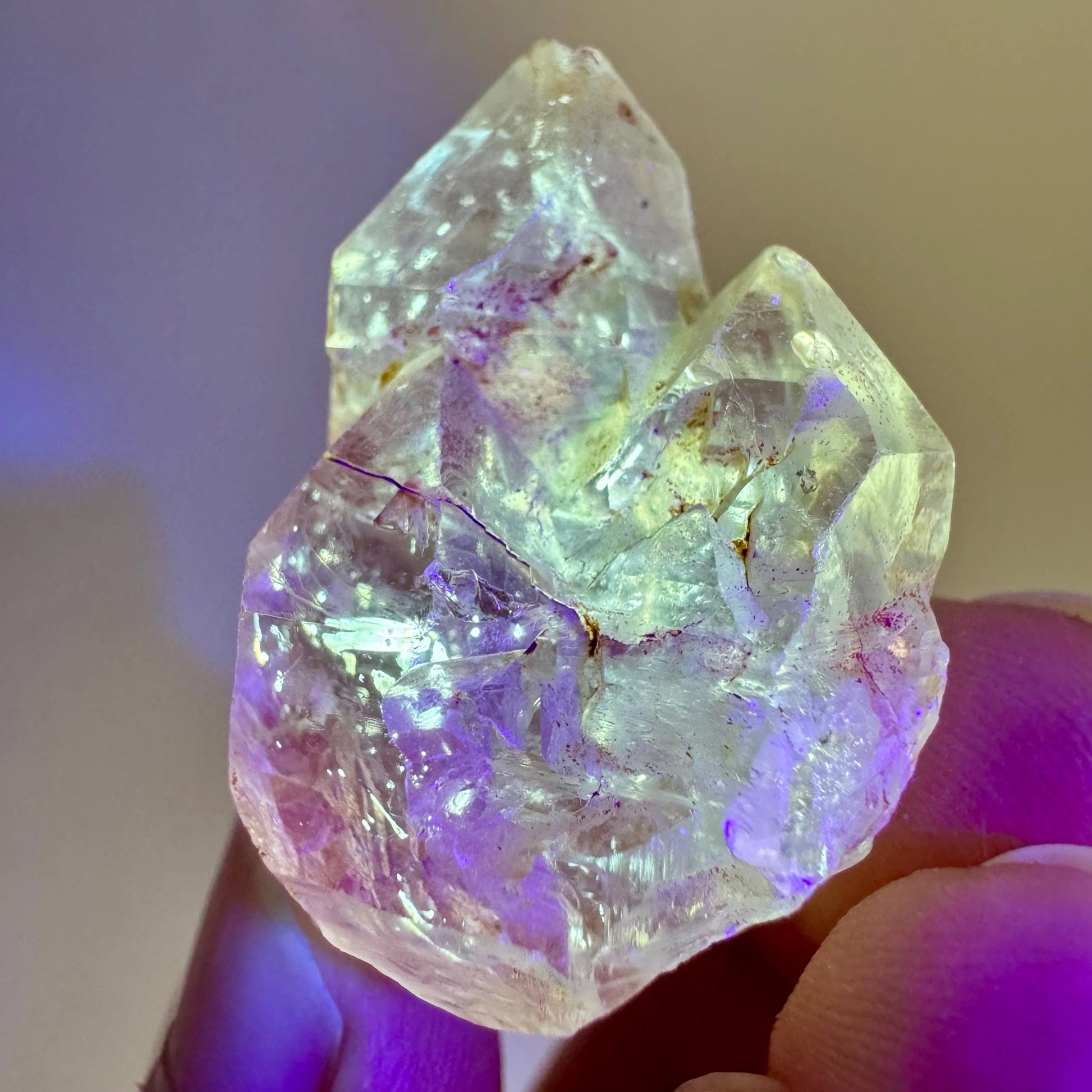 Firefly Petroleum Quartz | UV reactive crystal, fluorescent mineral from Madagascar