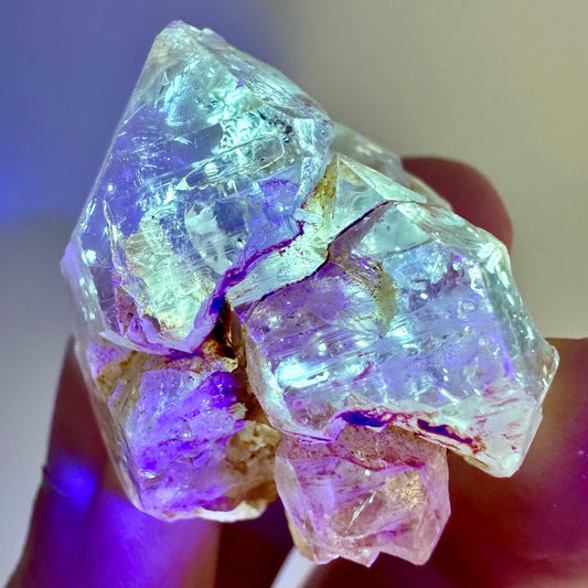 Firefly Petroleum Quartz | UV reactive crystal, fluorescent mineral from Madagascar