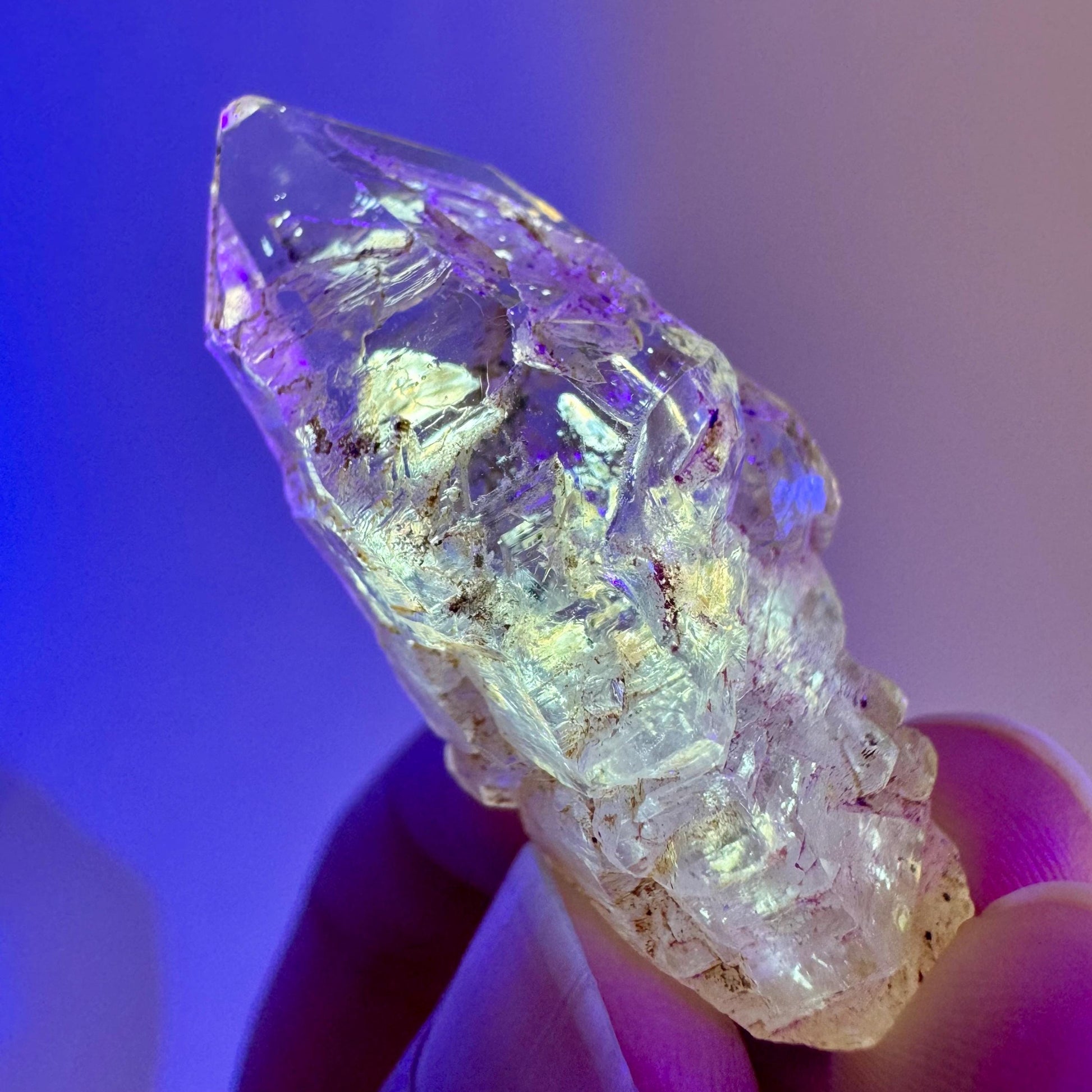 Firefly Petroleum Quartz | UV reactive crystal, fluorescent mineral from Madagascar