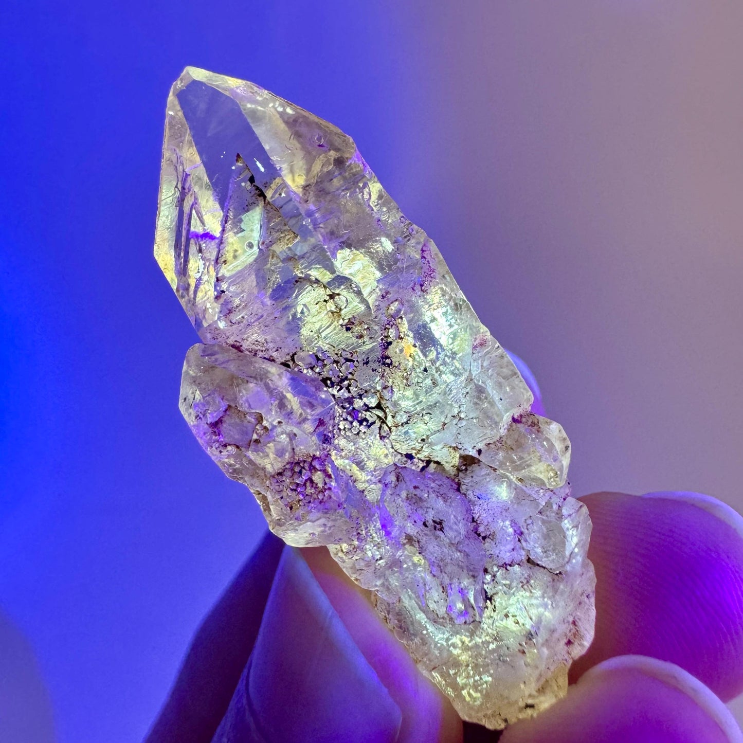 Firefly Petroleum Quartz | UV reactive crystal, fluorescent mineral from Madagascar
