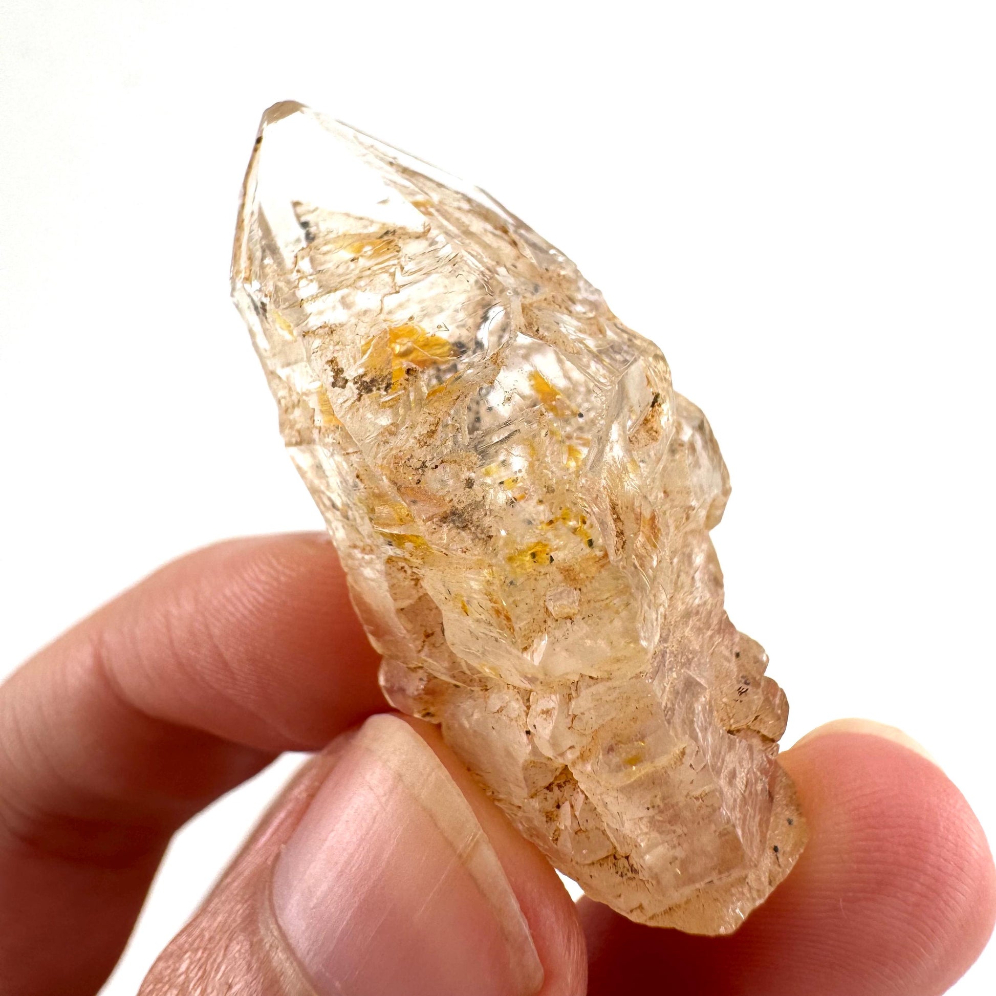 Firefly Petroleum Quartz | UV reactive crystal, fluorescent mineral from Madagascar