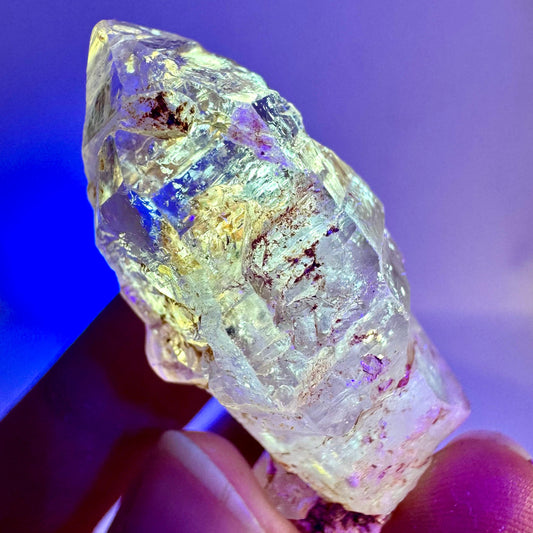 Firefly Petroleum Quartz Sceptre | UV reactive crystal, fluorescent mineral from Madagascar