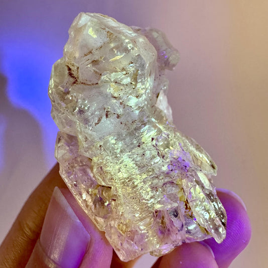 Firefly Petroleum Quartz | UV reactive crystal, fluorescent mineral from Madagascar