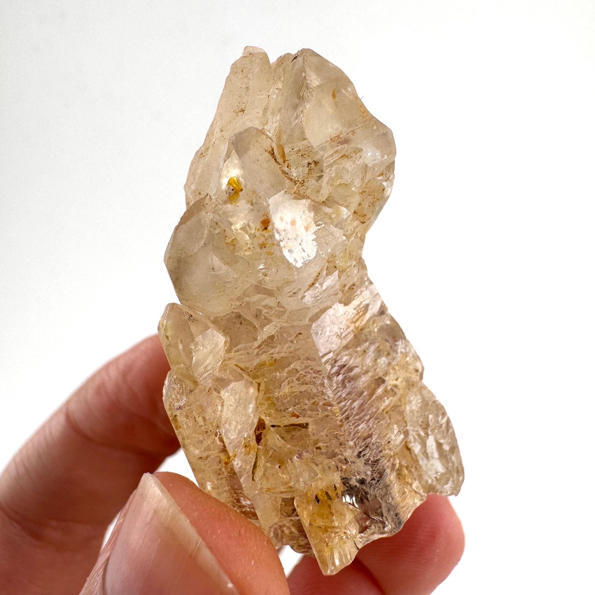 Firefly Petroleum Quartz | UV reactive crystal, fluorescent mineral from Madagascar