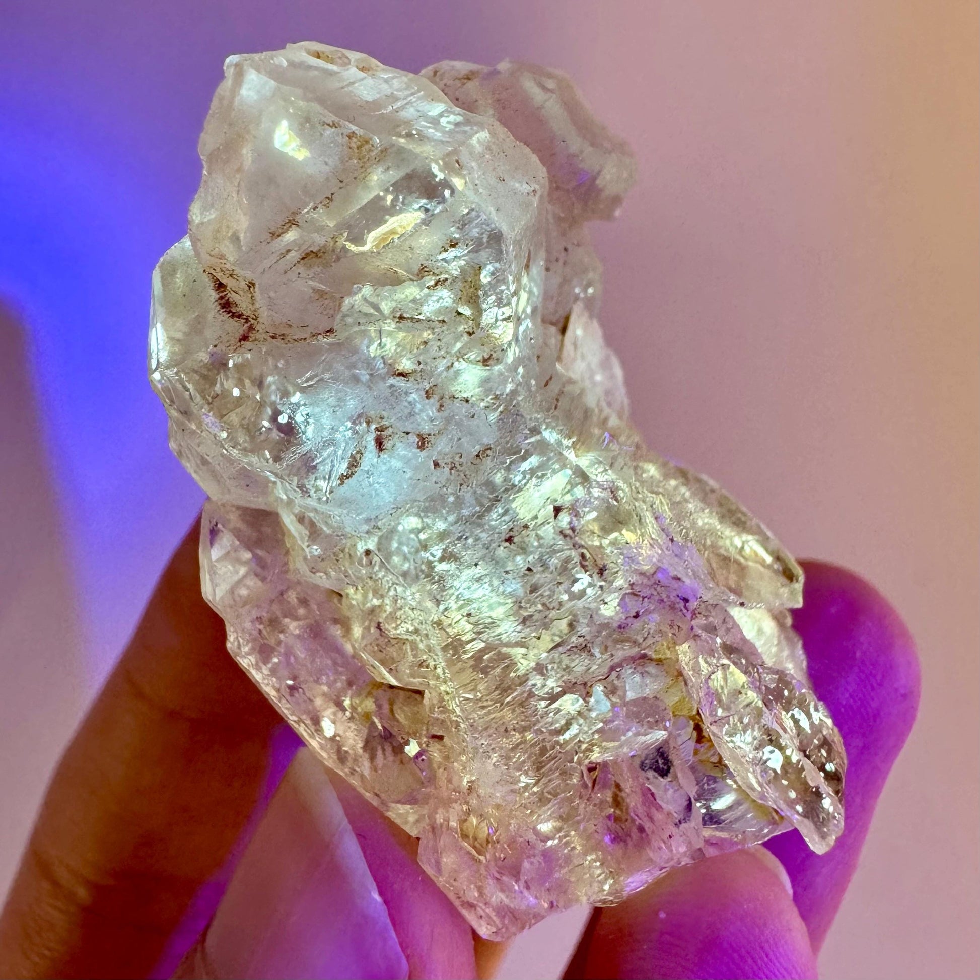 Firefly Petroleum Quartz | UV reactive crystal, fluorescent mineral from Madagascar