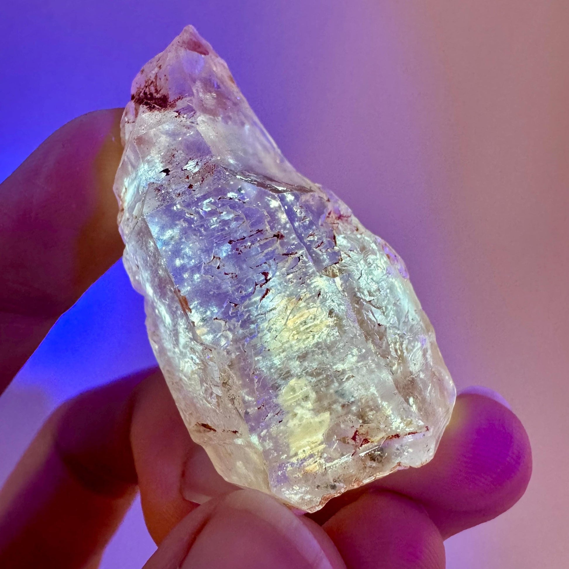 Firefly Petroleum Quartz | UV reactive crystal, fluorescent mineral from Madagascar