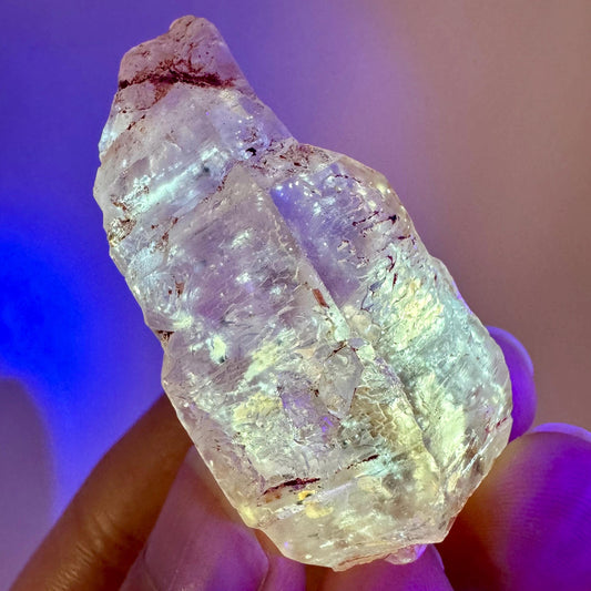 Firefly Petroleum Quartz | UV reactive crystal, fluorescent mineral from Madagascar