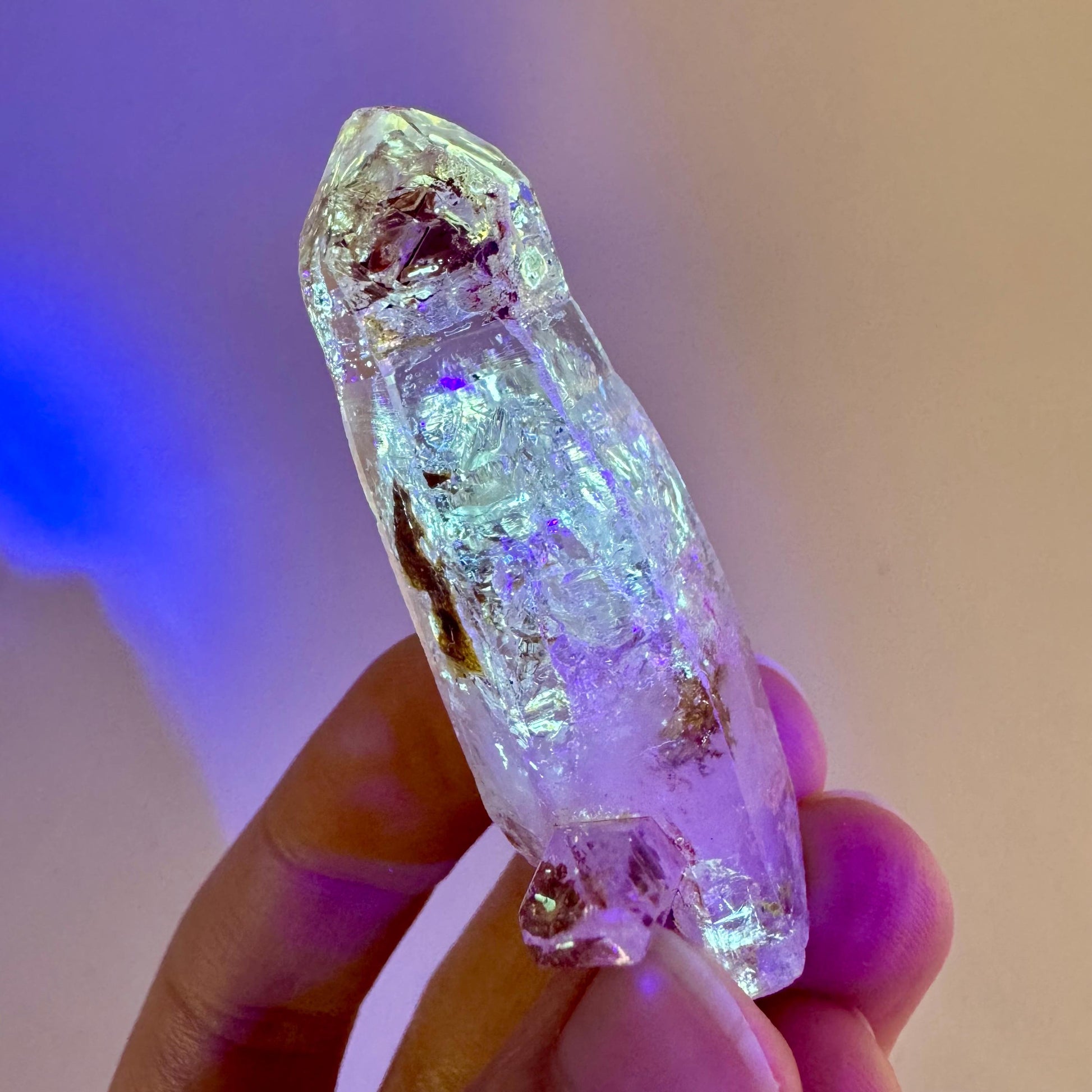 Firefly Petroleum Quartz | UV reactive crystal, fluorescent mineral from Madagascar