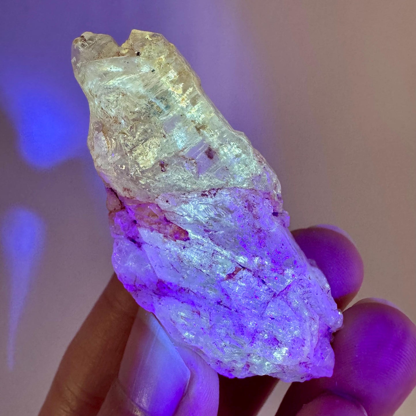 Firefly Petroleum Quartz | UV reactive crystal, fluorescent mineral from Madagascar