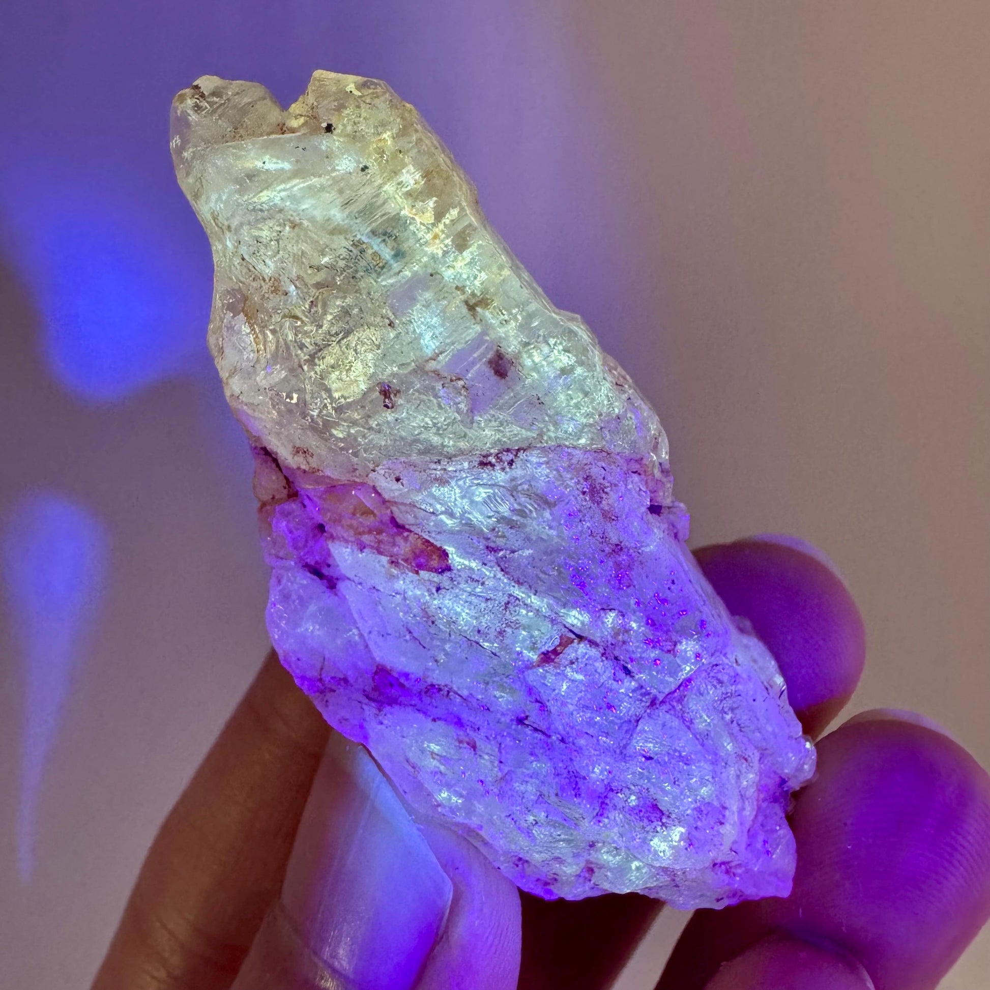Firefly Petroleum Quartz | UV reactive crystal, fluorescent mineral from Madagascar