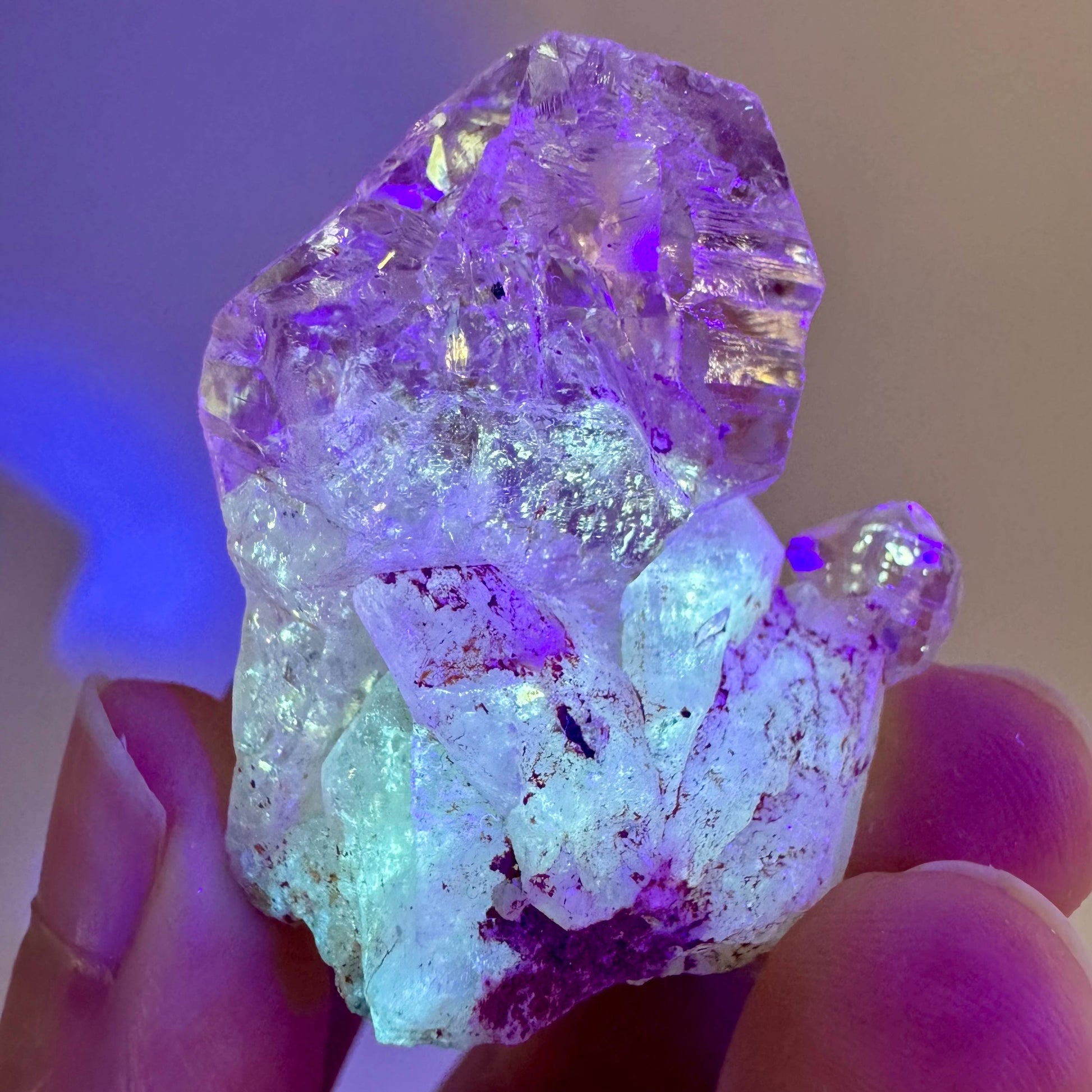 Firefly Petroleum Quartz | UV reactive crystal, fluorescent mineral from Madagascar