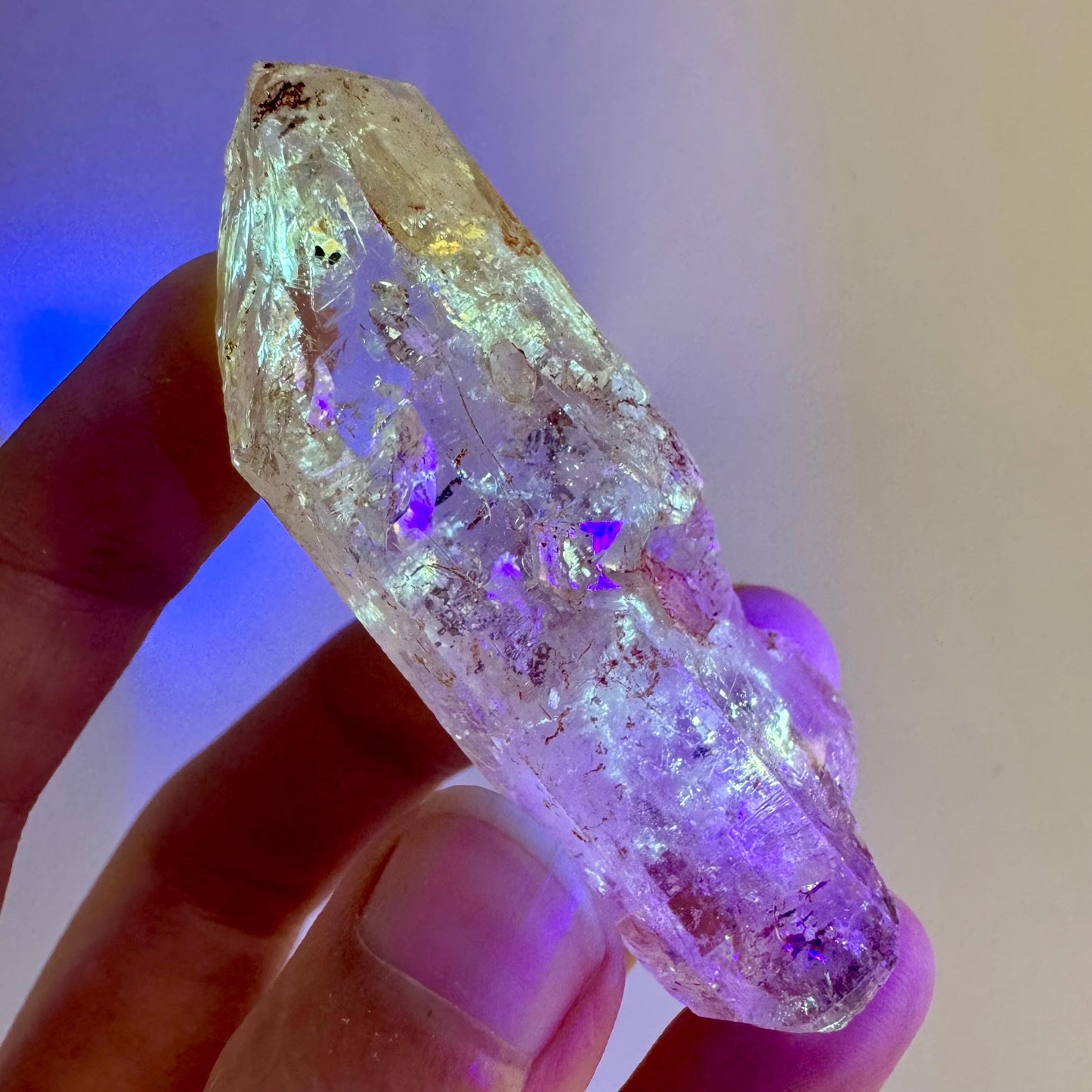 Firefly Petroleum Quartz | UV reactive crystal, fluorescent mineral from Madagascar