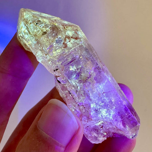 Firefly Petroleum Quartz | UV reactive crystal, fluorescent mineral from Madagascar