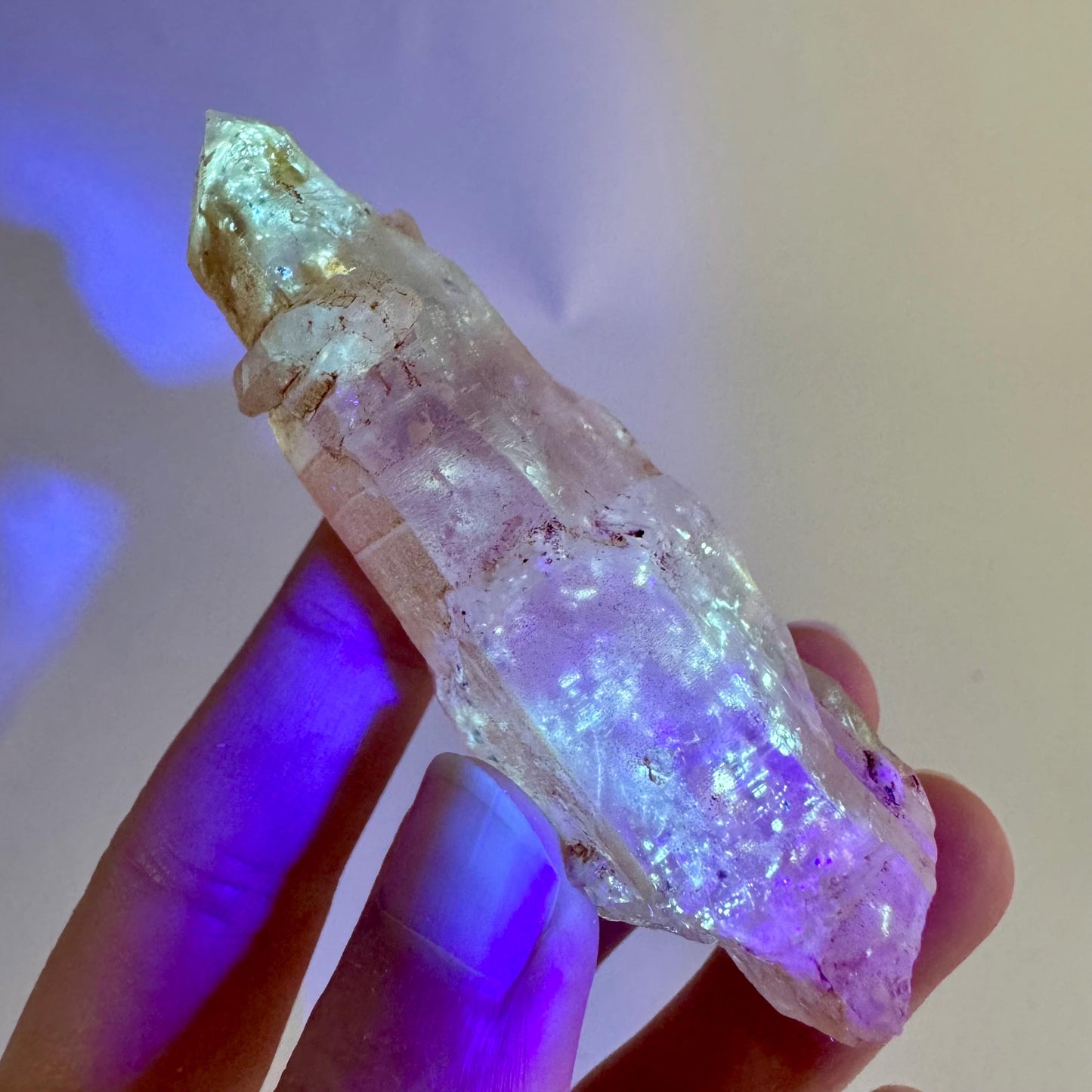 Firefly Petroleum Quartz | UV reactive crystal, fluorescent mineral from Madagascar