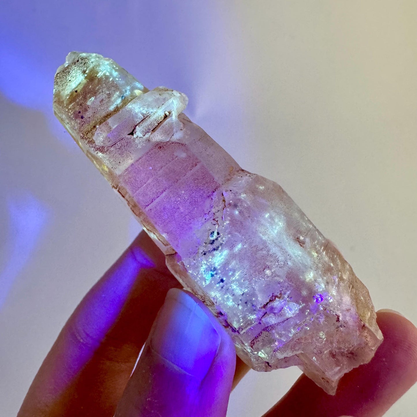 Firefly Petroleum Quartz | UV reactive crystal, fluorescent mineral from Madagascar
