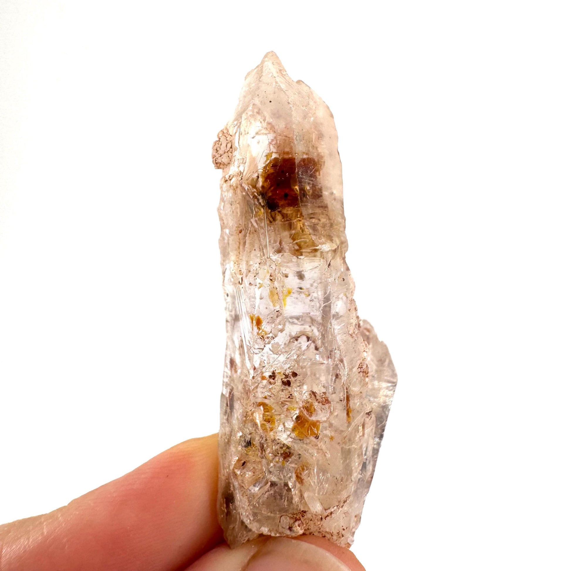 Firefly Petroleum Quartz | UV reactive crystal, fluorescent mineral from Madagascar
