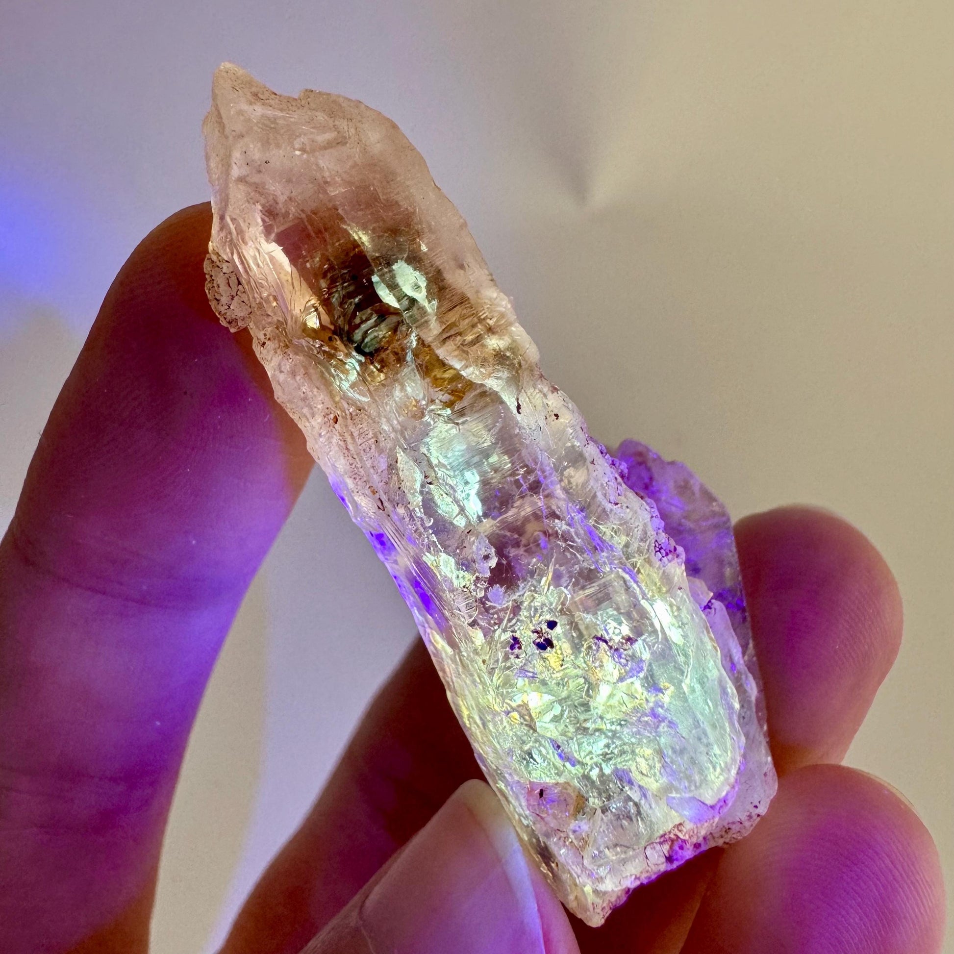Firefly Petroleum Quartz | UV reactive crystal, fluorescent mineral from Madagascar